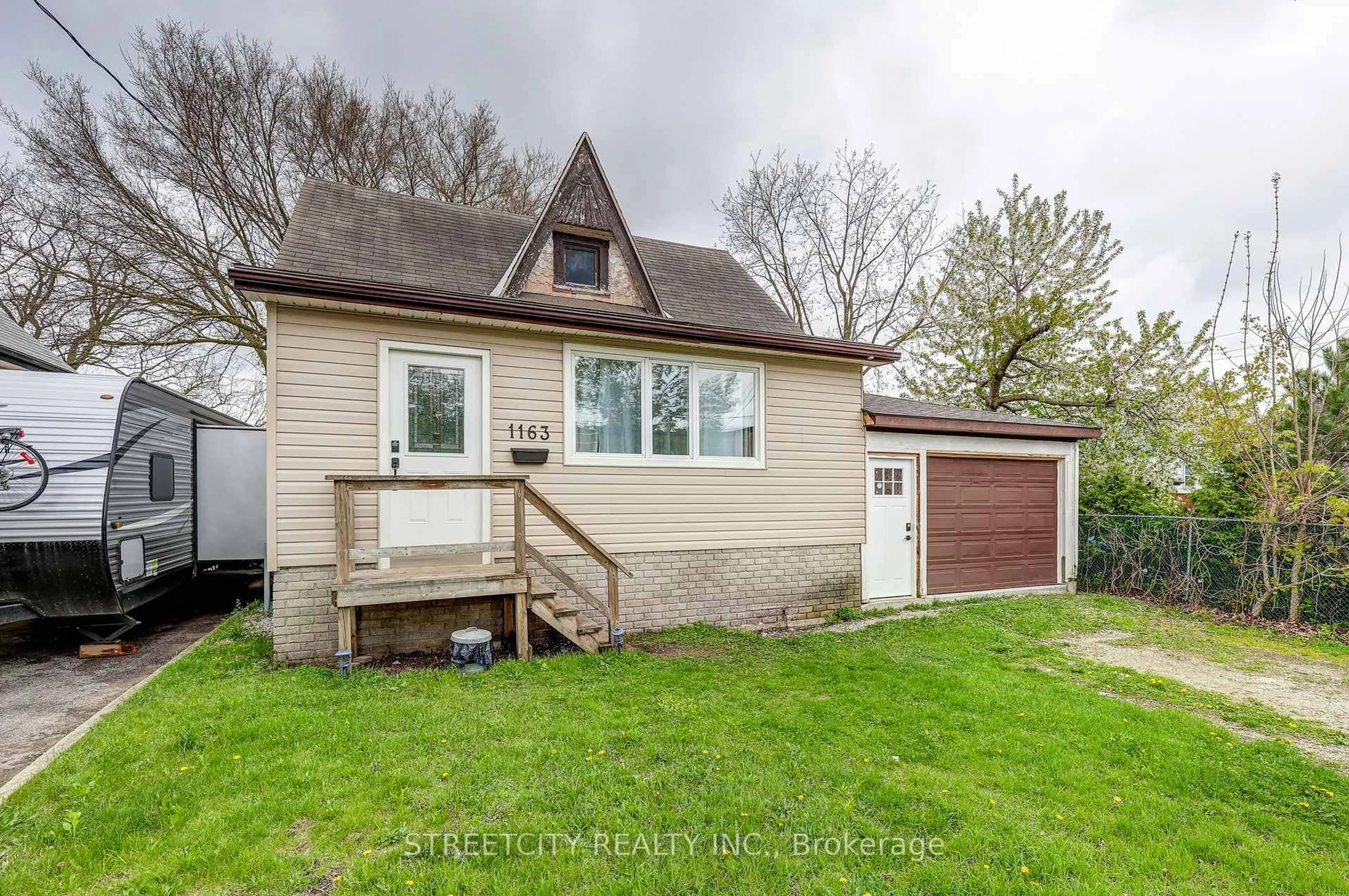 Home with vinyl exterior material, street for 1163 York St, London East Ontario N5W 2T8