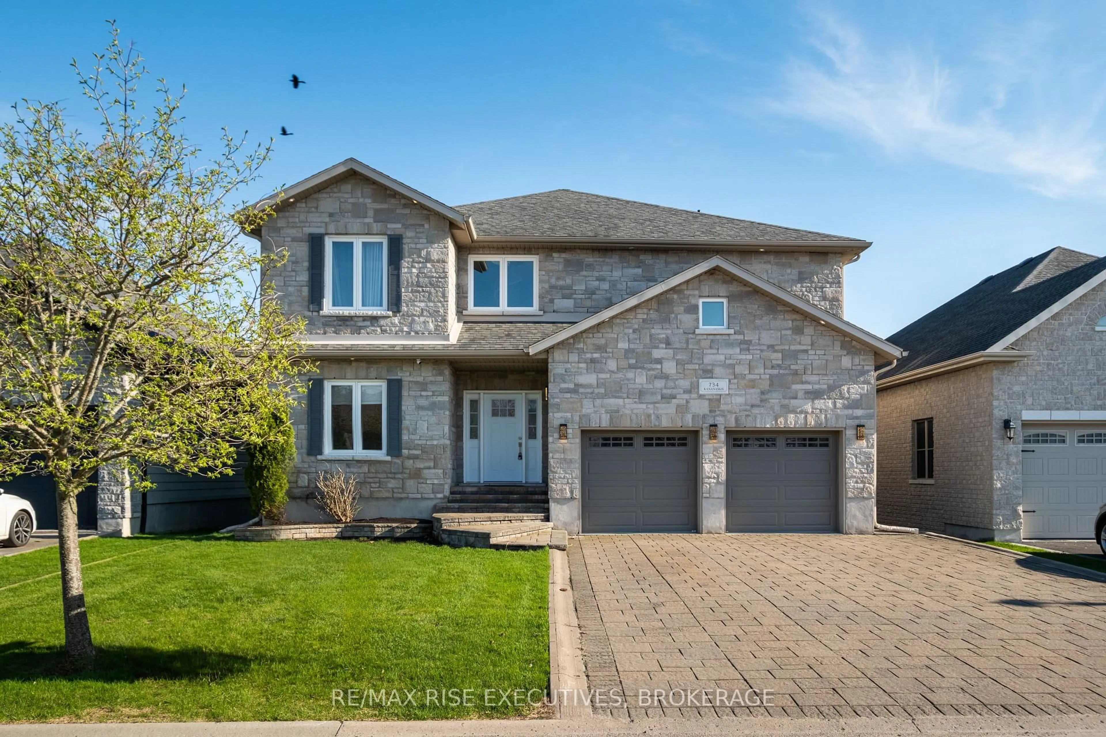 Home with brick exterior material, street for 734 Kananaskis Dr, Kingston Ontario K7P 0A9