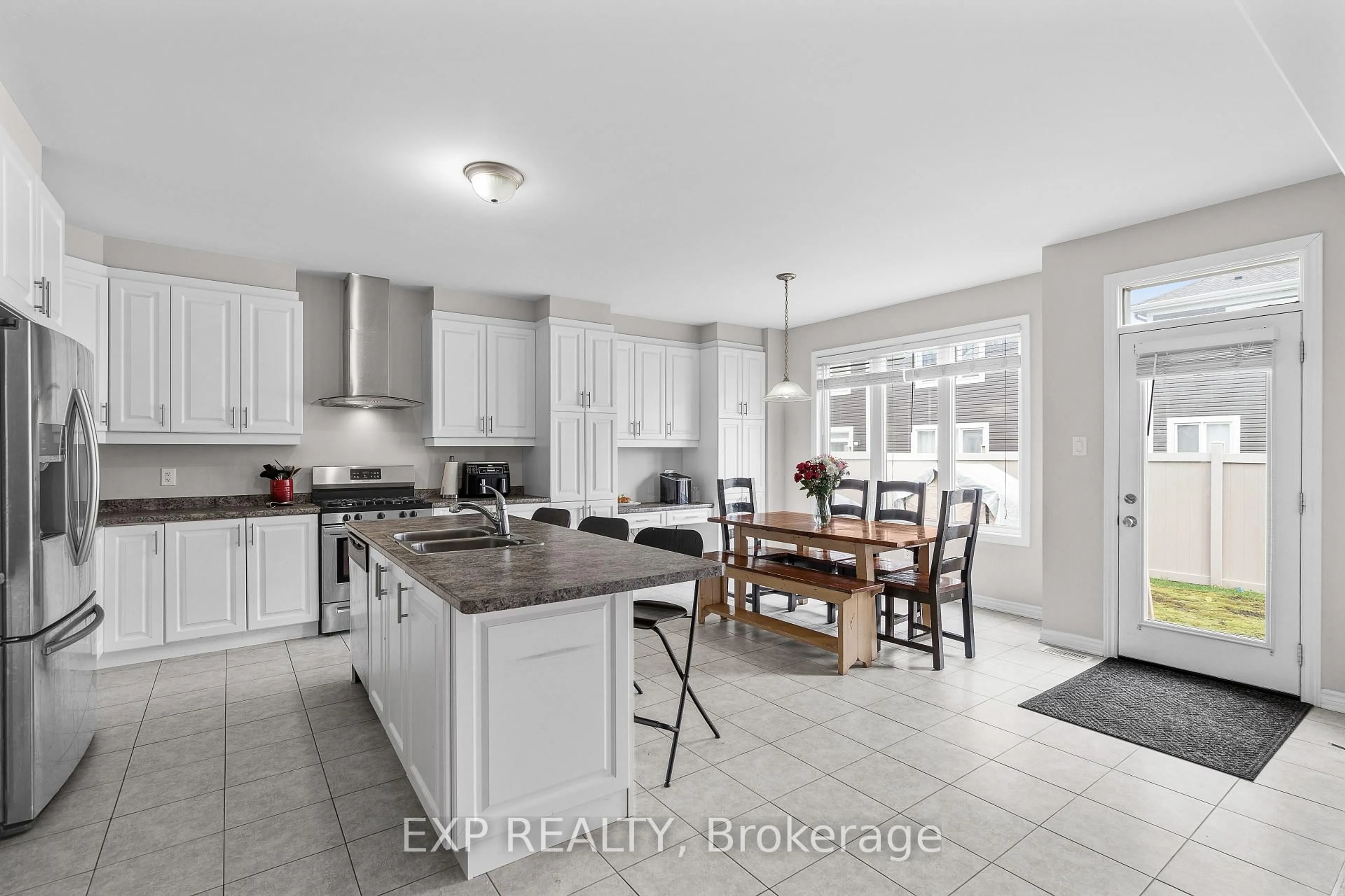 Open concept kitchen, ceramic/tile floor for 206 Ponderosa St, Ottawa Ontario K2V 0J6