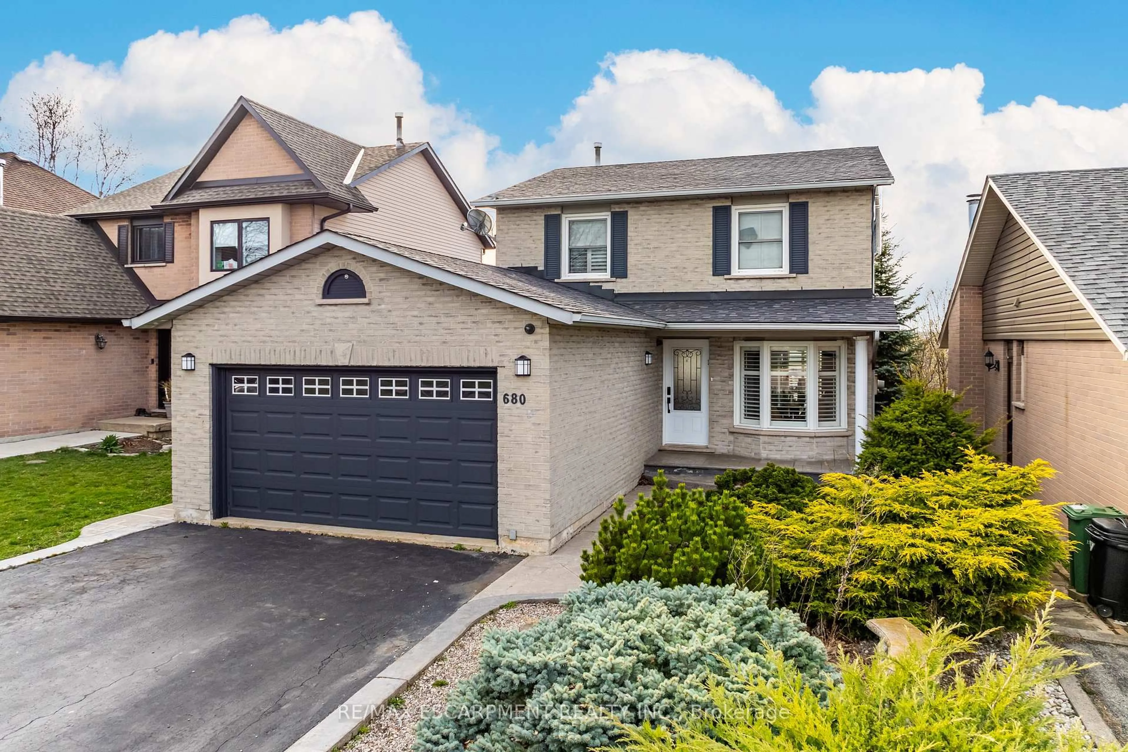 Home with vinyl exterior material, street for 680 Rexford Dr, Hamilton Ontario L8W 3G1