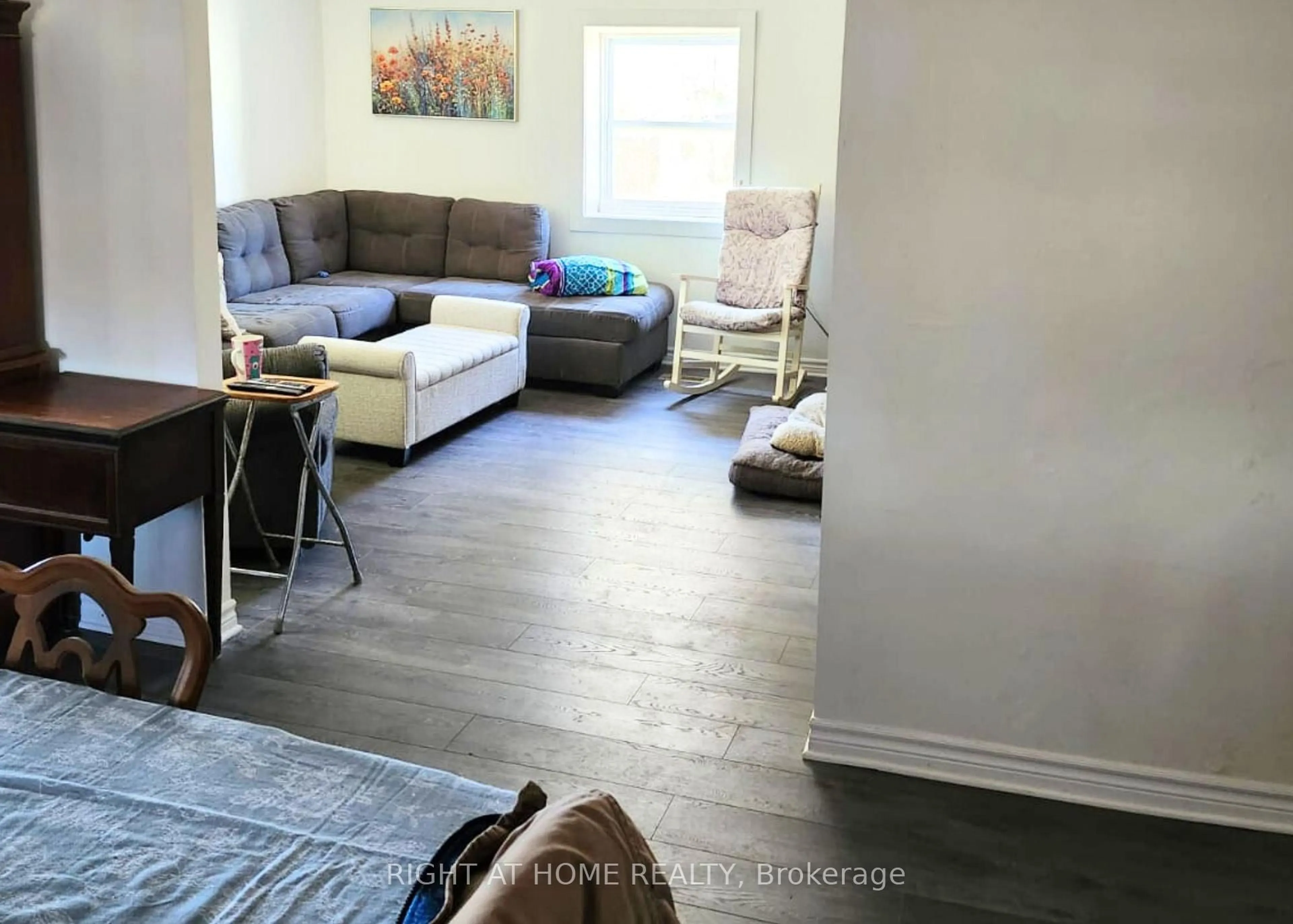 Living room with furniture, wood/laminate floor for 297 Power Rd, Shannonville Ontario K0K 3A0