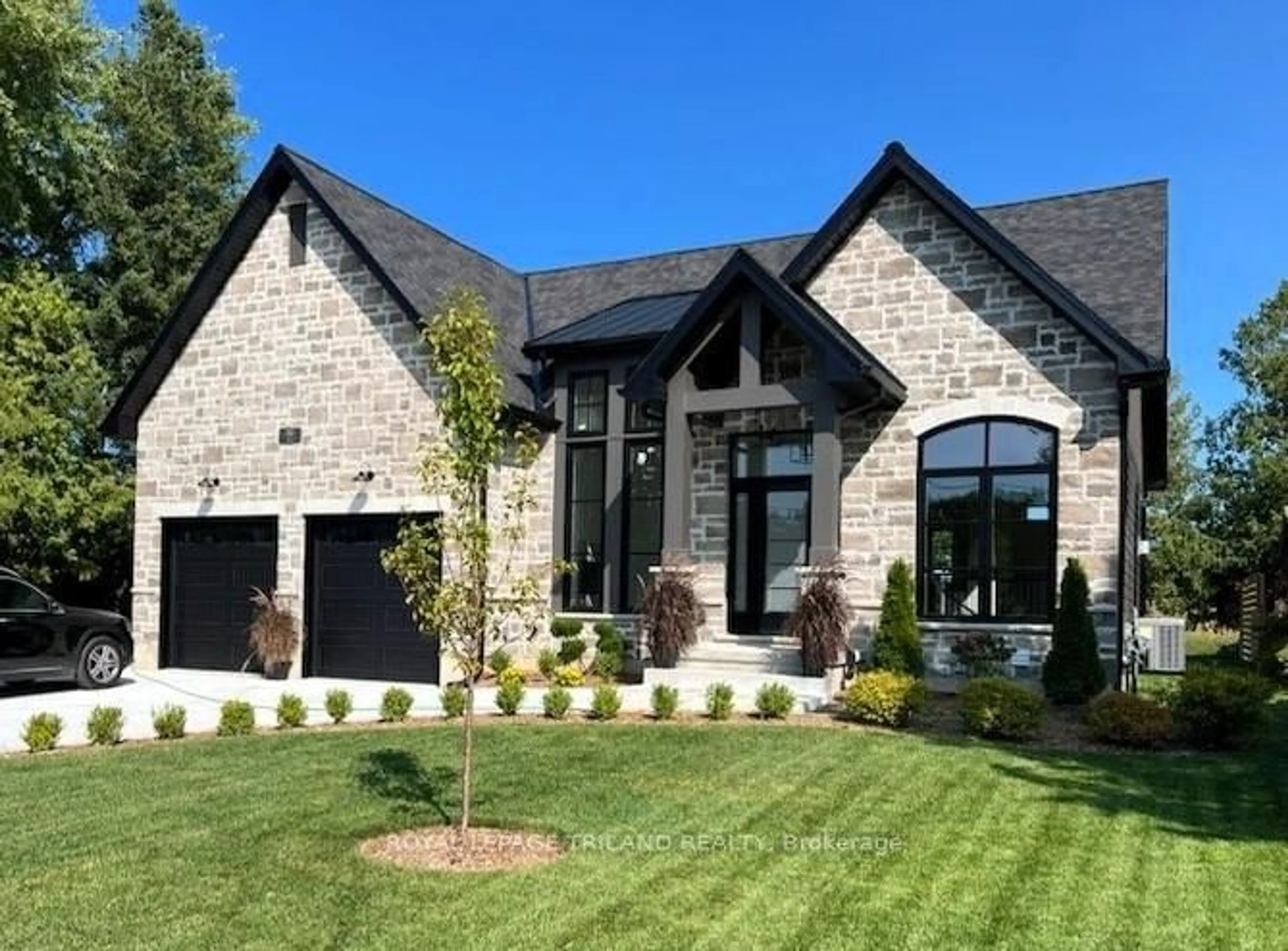 Home with brick exterior material, street for 30 Gill Rd, Lambton Shores Ontario N0M 1T0