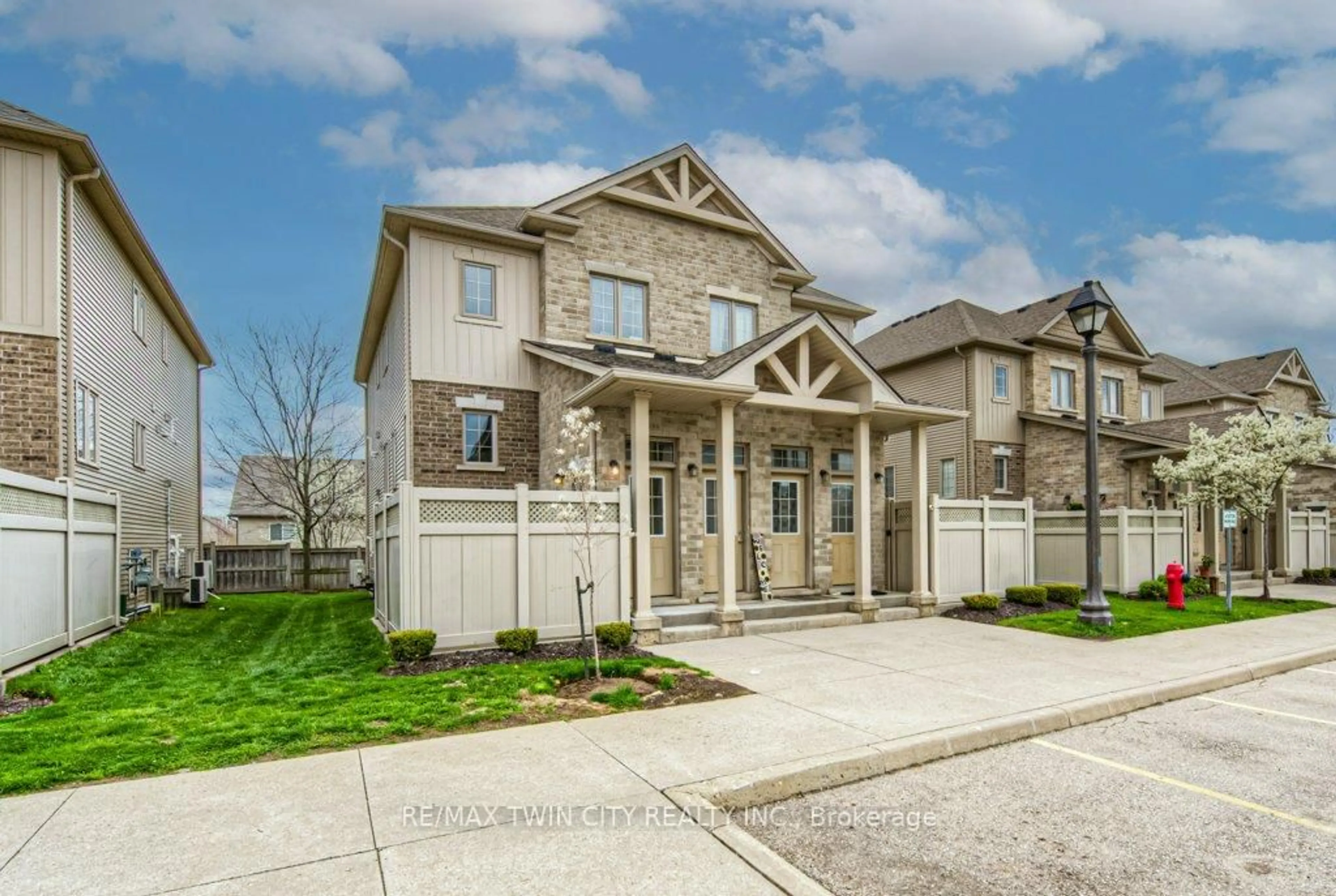 Home with brick exterior material, street for 228 Jessica Cres #A, Kitchener Ontario N2R 0C5