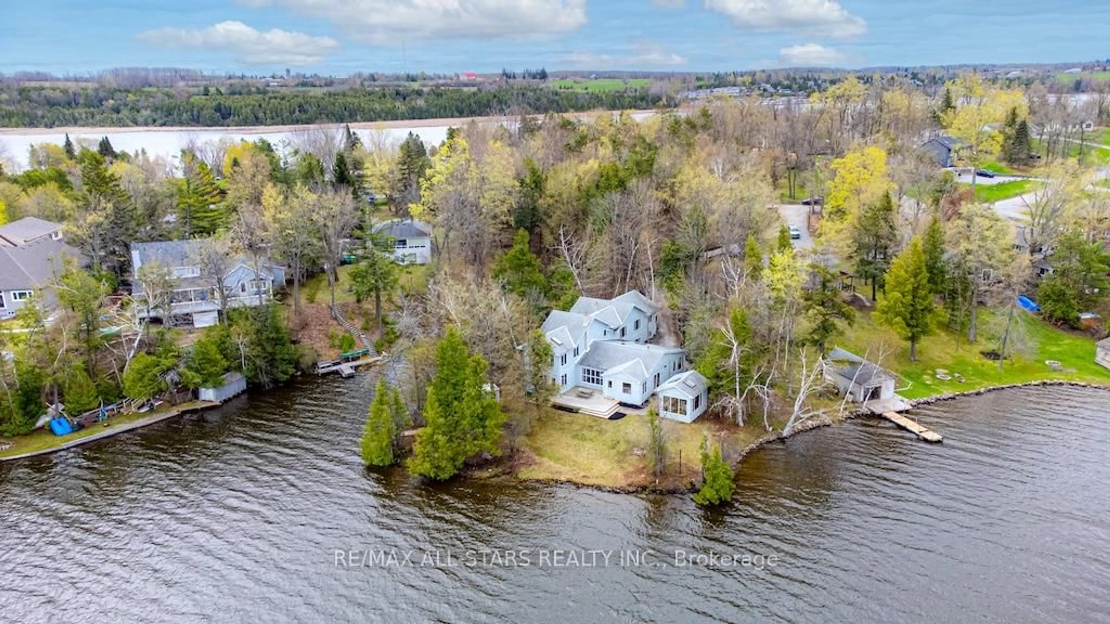 A pic from outside/outdoor area/front of a property/back of a property/a pic from drone, water/lake/river/ocean view for 128 Maryland Dr, Selwyn Ontario K9T 6X3