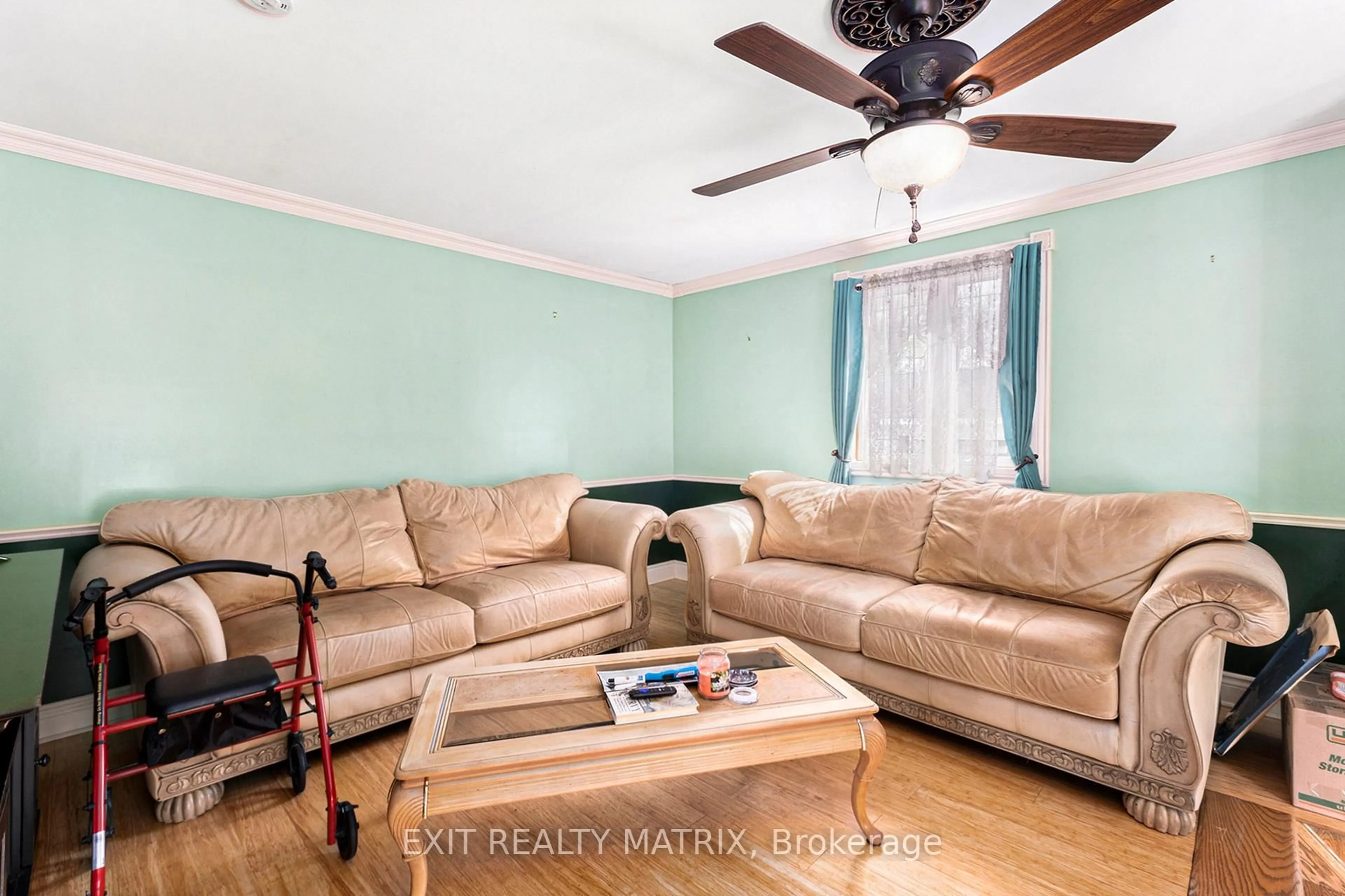 Living room with furniture, wood/laminate floor for 4885 138 Highway, South Stormont Ontario K0C 2A0