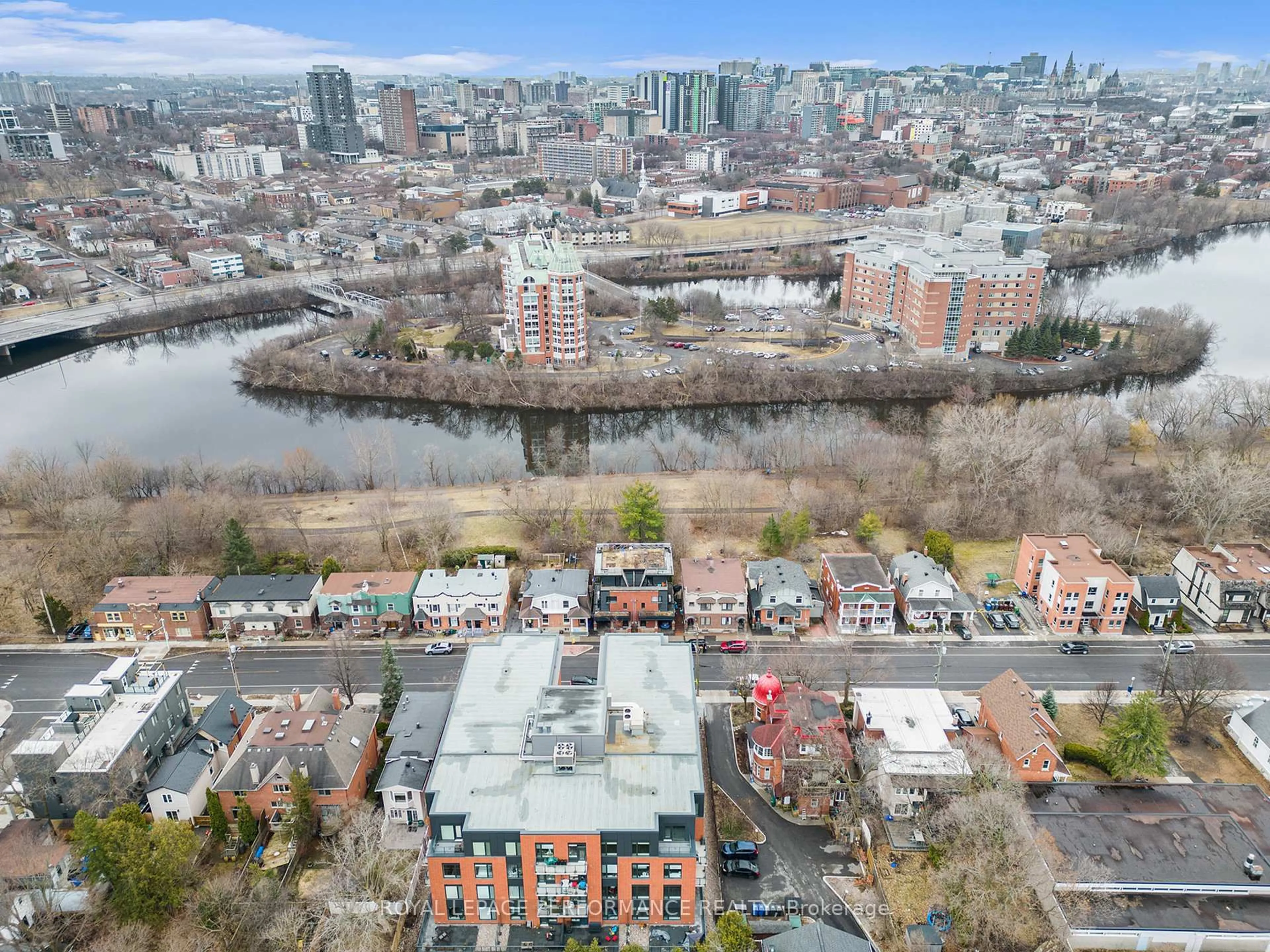A pic from outside/outdoor area/front of a property/back of a property/a pic from drone, city buildings view from balcony for 327 Crichton St, Ottawa Ontario K1M 1W3