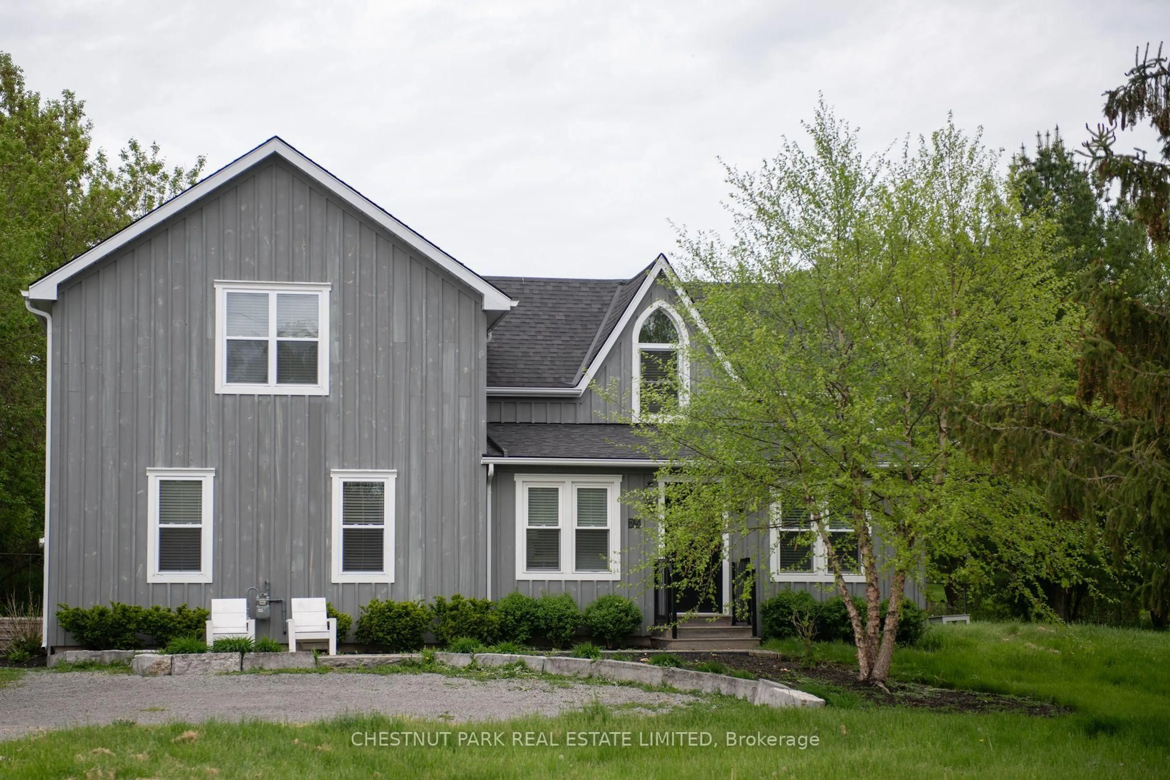 Home with vinyl exterior material, street for 25 Stanley St, Prince Edward County Ontario K0K 1G0