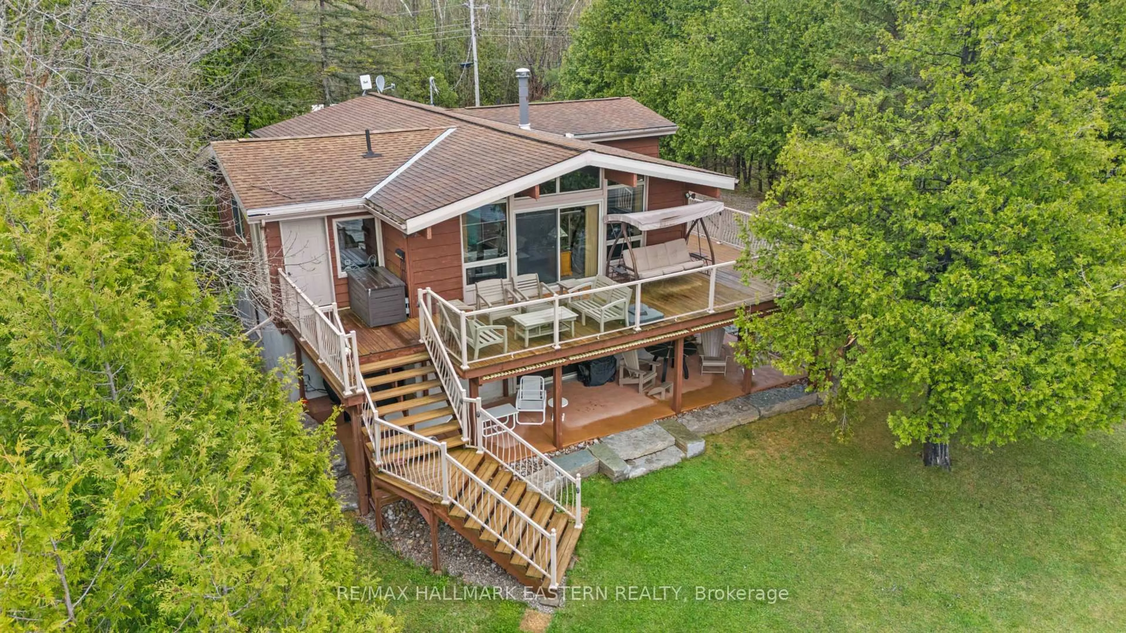 A pic from outside/outdoor area/front of a property/back of a property/a pic from drone, water/lake/river/ocean view for 118 Fire Route 71 N/A, Galway-Cavendish and Harvey Ontario K0L 1J0