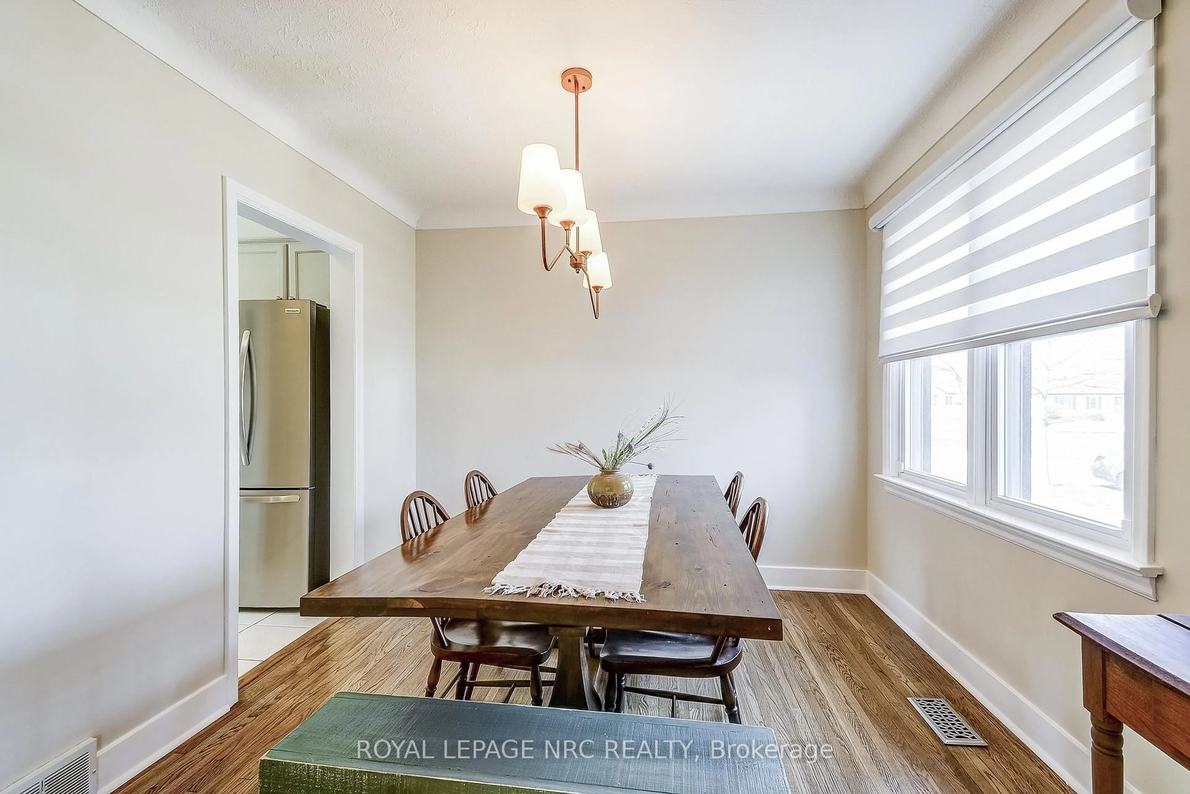 Dining room, wood/laminate floor for 44 Windsor Rd, St. Catharines Ontario L2N 3A3