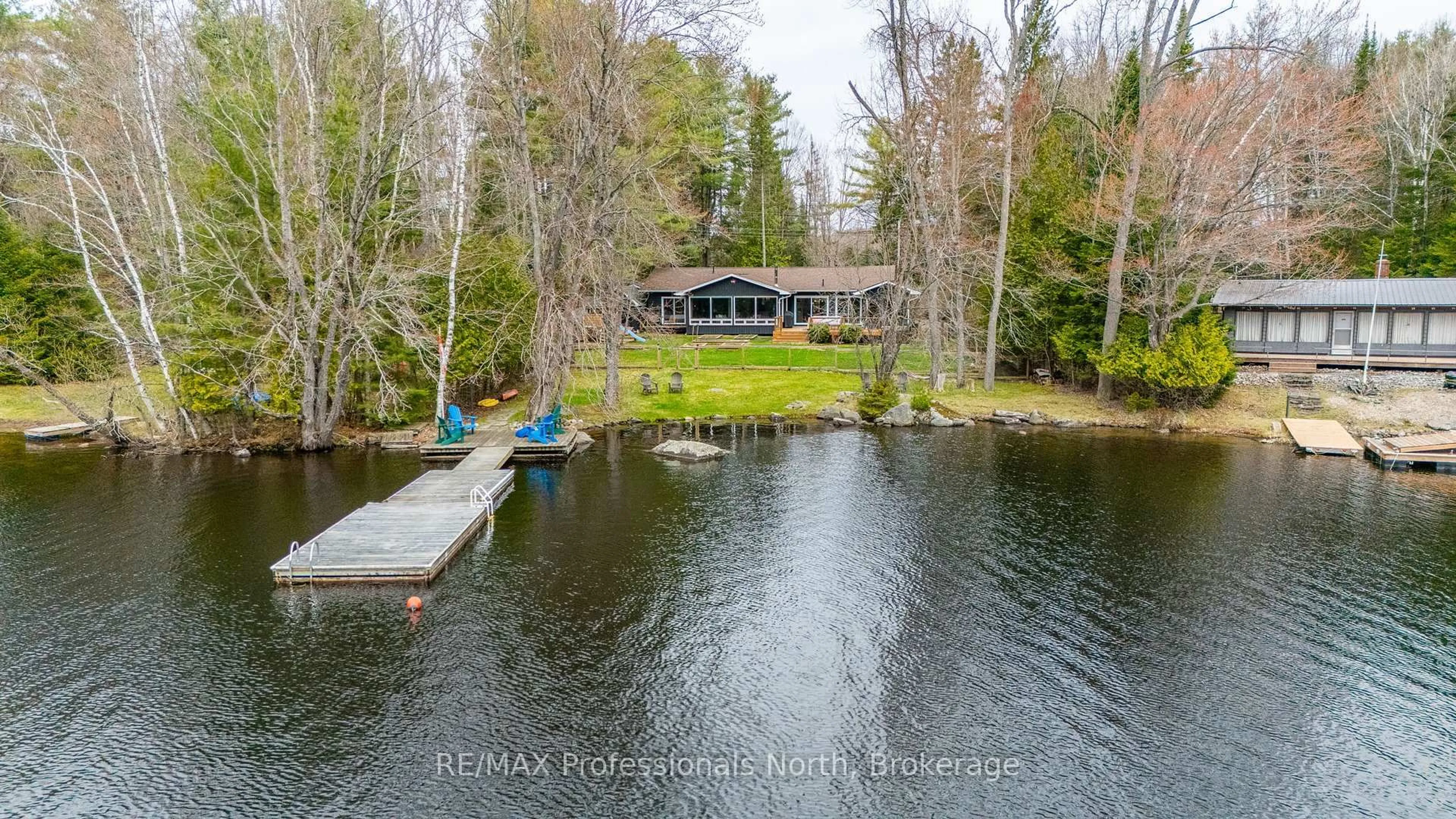 A pic from outside/outdoor area/front of a property/back of a property/a pic from drone, water/lake/river/ocean view for 1186 Peninsula Dr, Dysart et al Ontario K0M 1S0