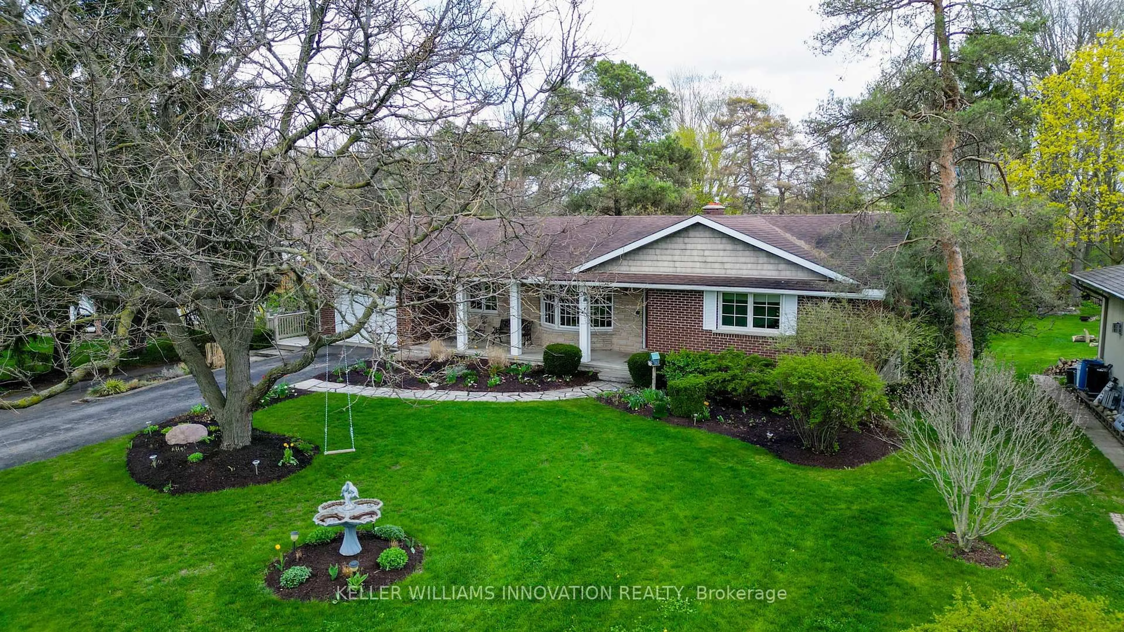 A pic from outside/outdoor area/front of a property/back of a property/a pic from drone, street for 135 Golf Course Rd, Woolwich Ontario N0B 1N0