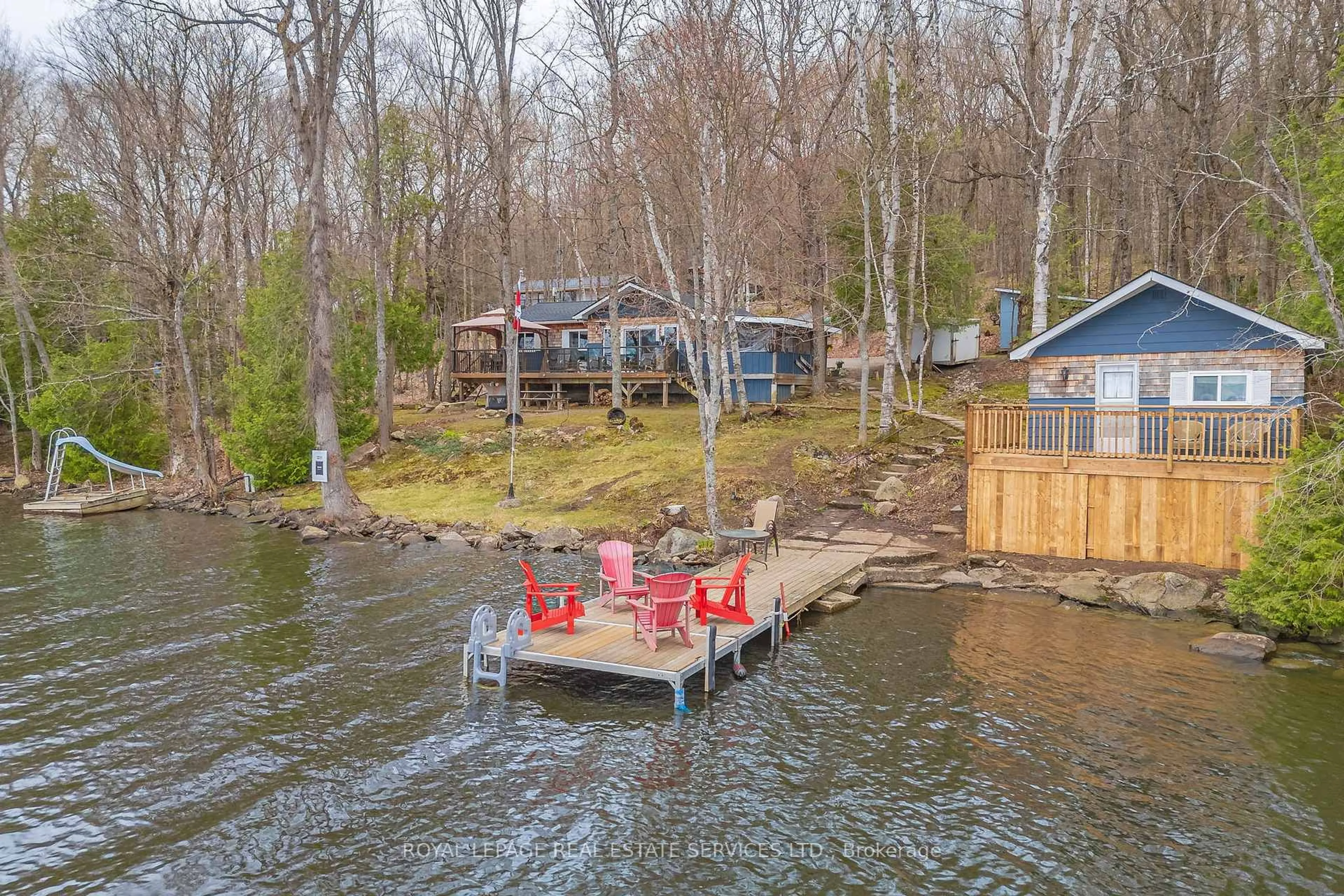 A pic from outside/outdoor area/front of a property/back of a property/a pic from drone, water/lake/river/ocean view for 1158 Shea Rd #29, Muskoka Lakes Ontario P0B 1M0