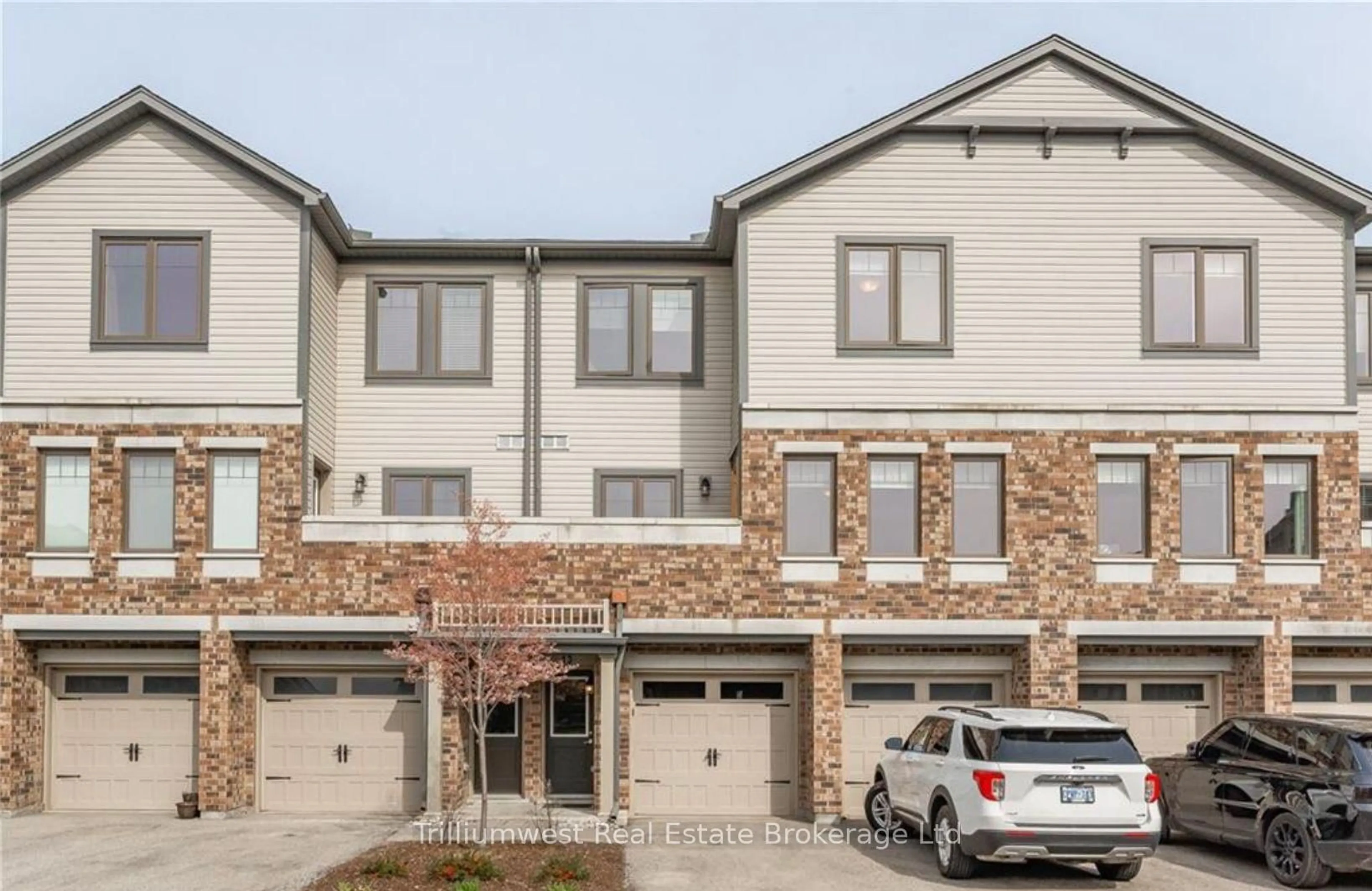 Home with brick exterior material, street for 39 Kay Cres #13, Guelph Ontario N1L 0N5