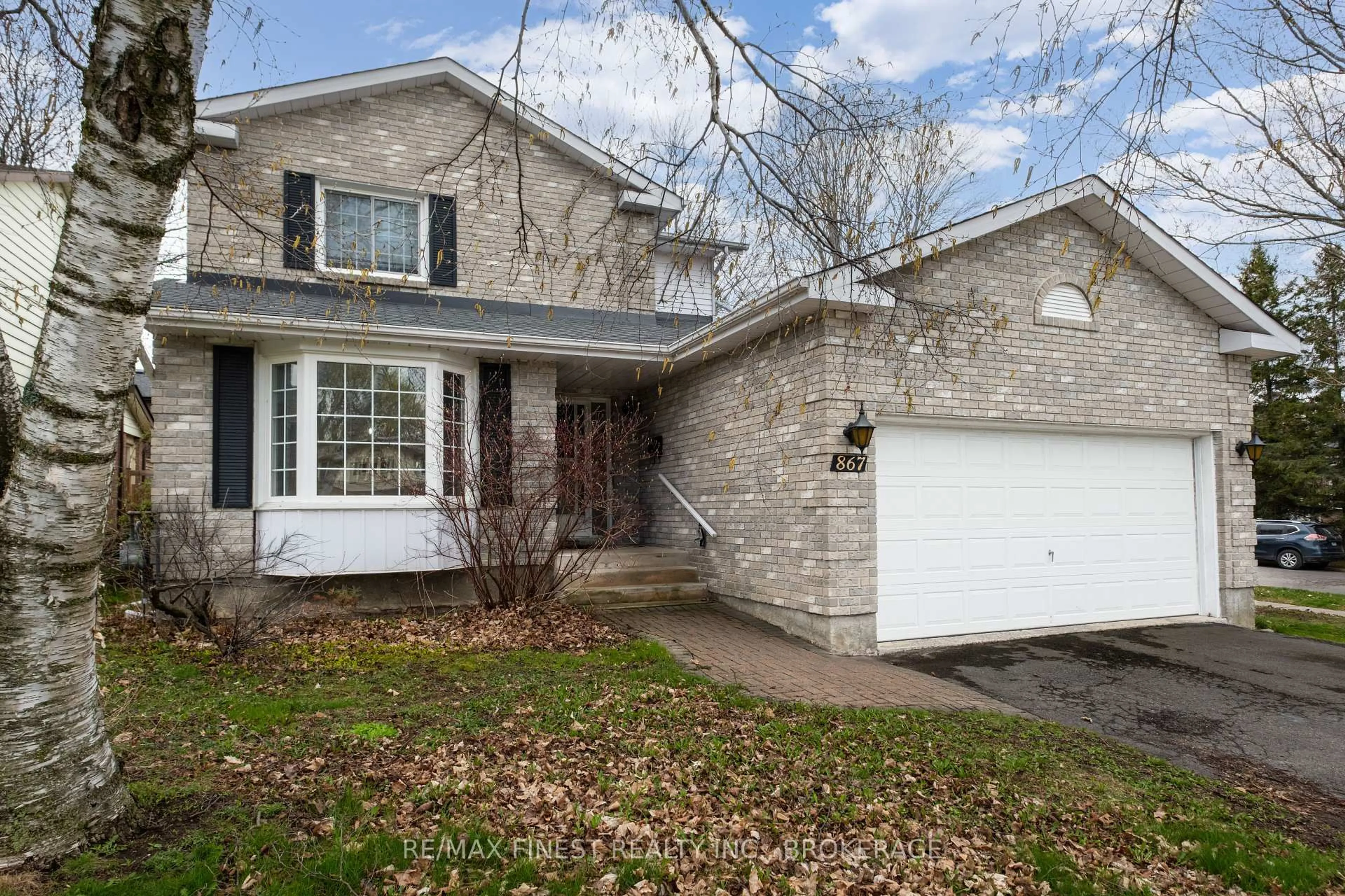Home with brick exterior material, street for 867 Woodside Dr, Kingston Ontario K7P 1S9