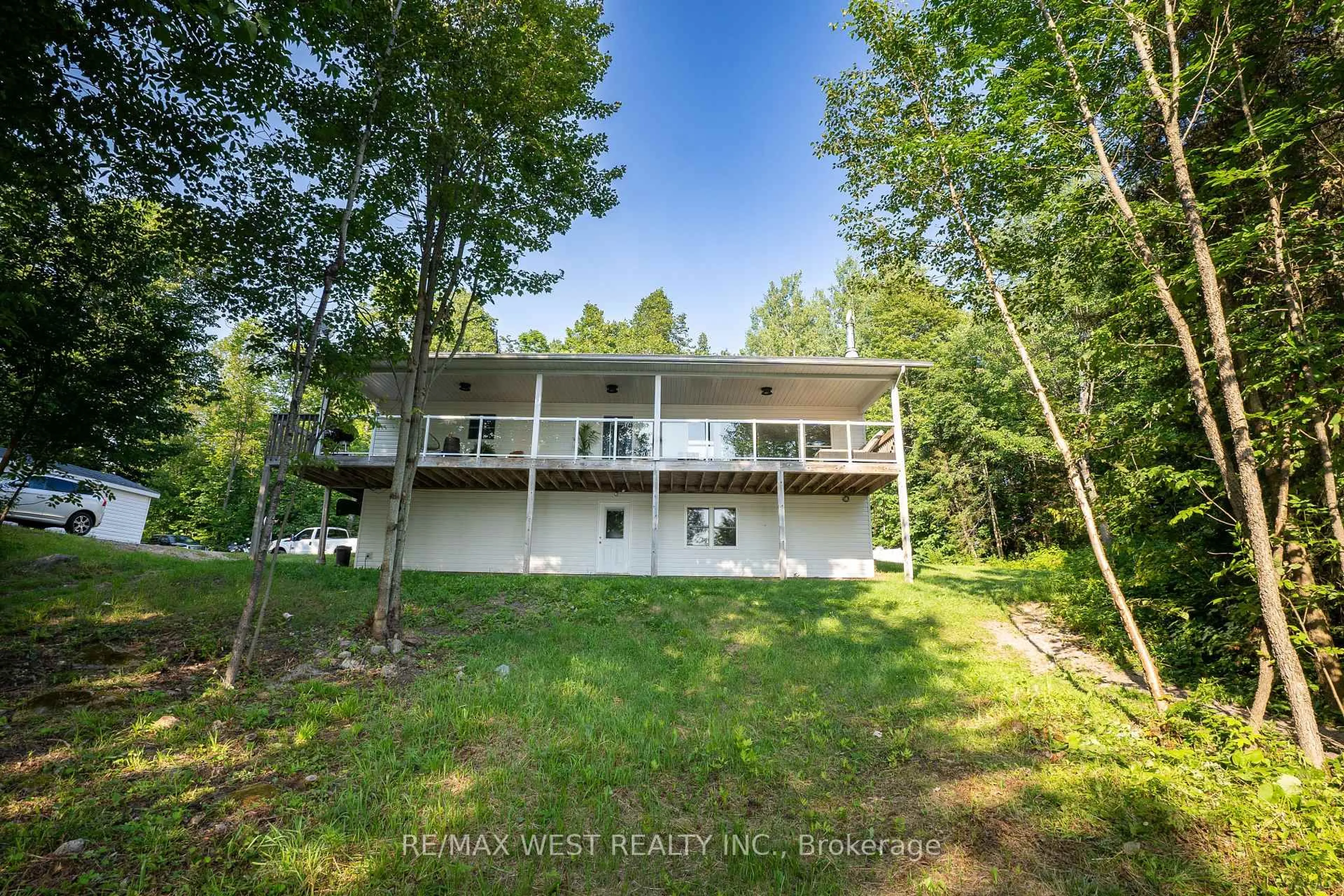 A pic from outside/outdoor area/front of a property/back of a property/a pic from drone, water/lake/river/ocean view for 501 Golf Course Rd, Chisholm Ontario P0H 1Z0