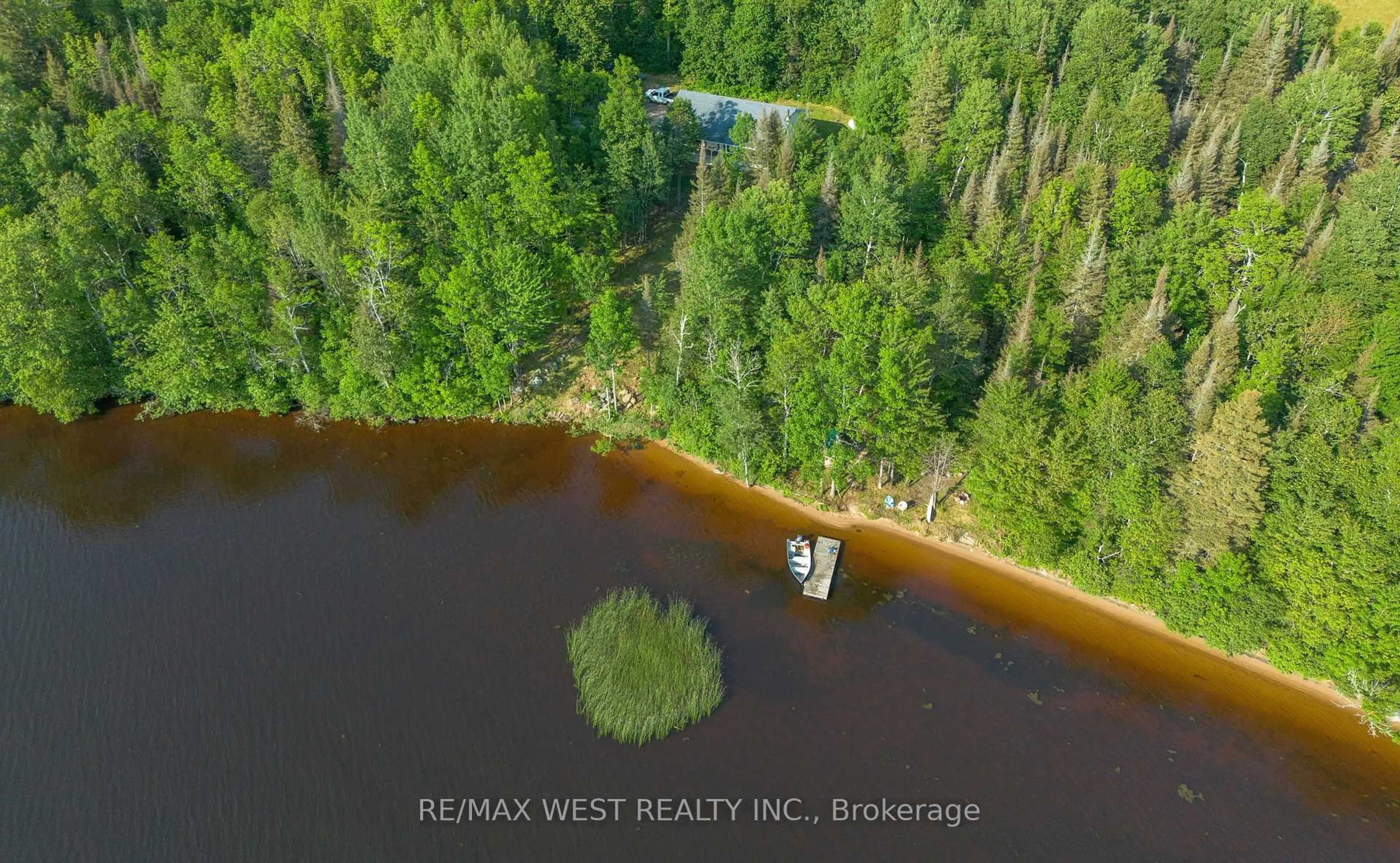 A pic from outside/outdoor area/front of a property/back of a property/a pic from drone, water/lake/river/ocean view for 501 Golf Course Rd, Chisholm Ontario P0H 1Z0