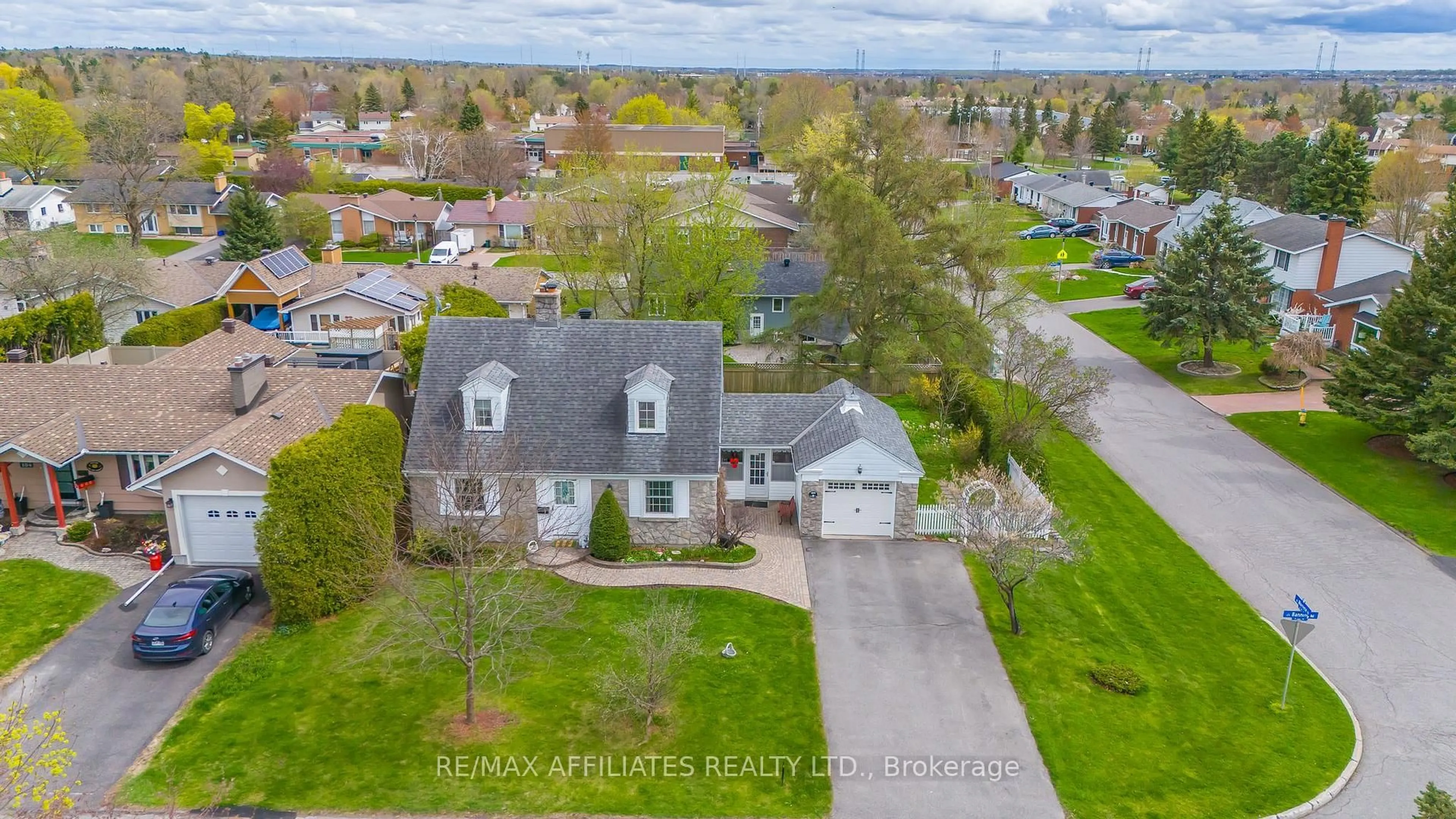 A pic from outside/outdoor area/front of a property/back of a property/a pic from drone, street for 188 Banning Rd, Kanata Ontario K2L 1C4