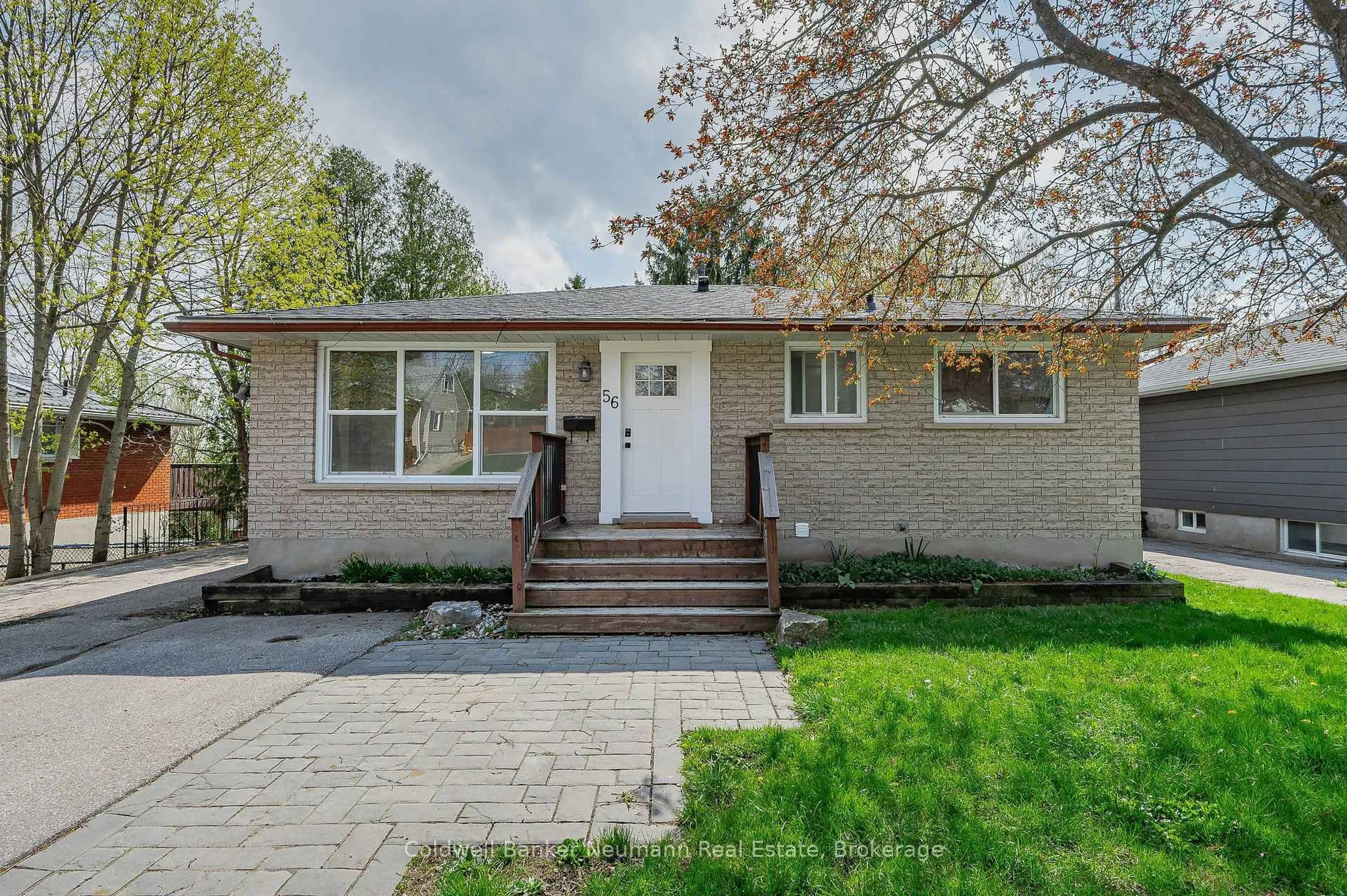Home with brick exterior material, street for 56 Ridgewood Ave, Guelph Ontario N1H 6C5