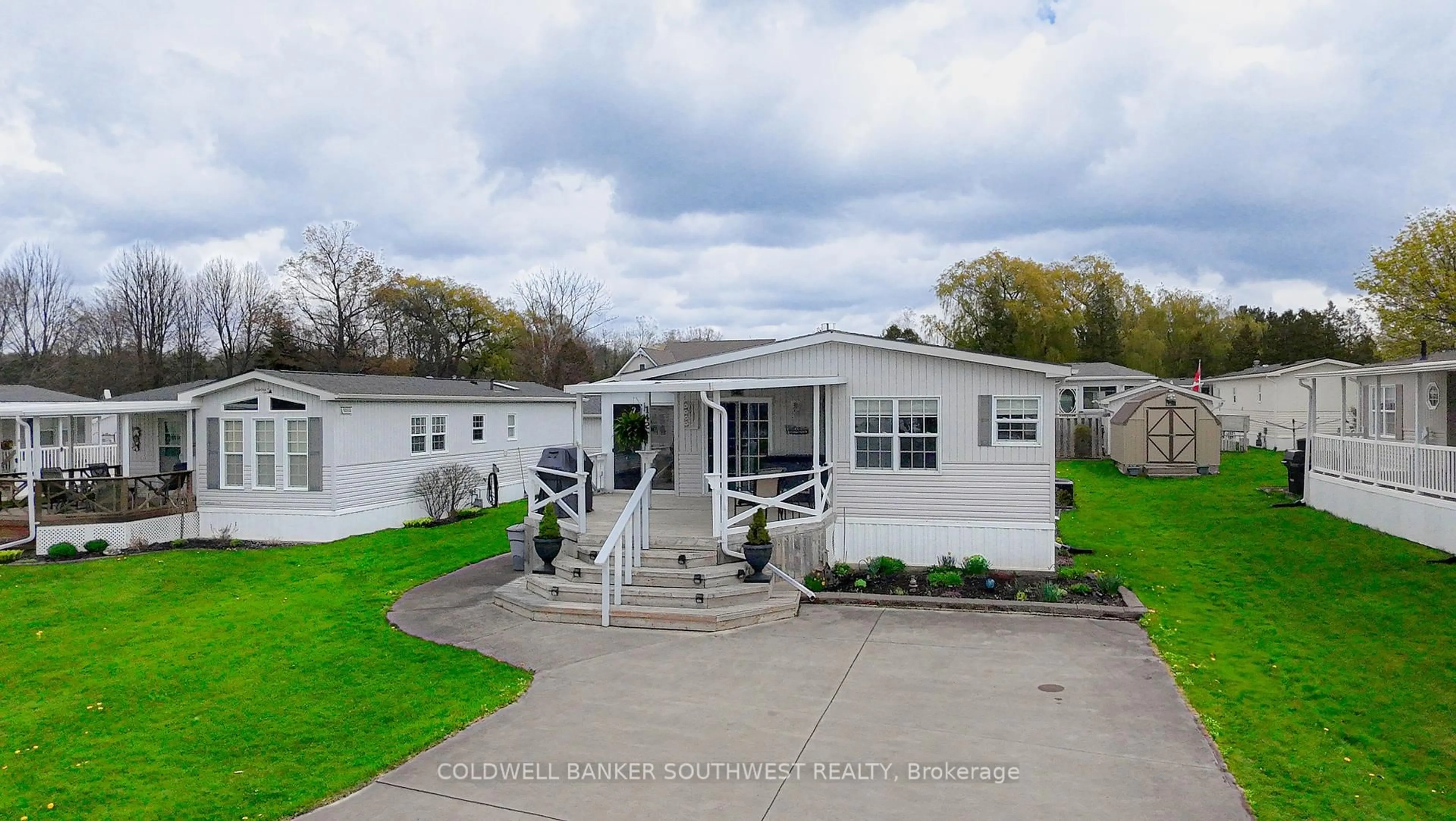 Home with vinyl exterior material, street for 142 Sandbagger Cres, Bluewater Ontario N0M 1G0