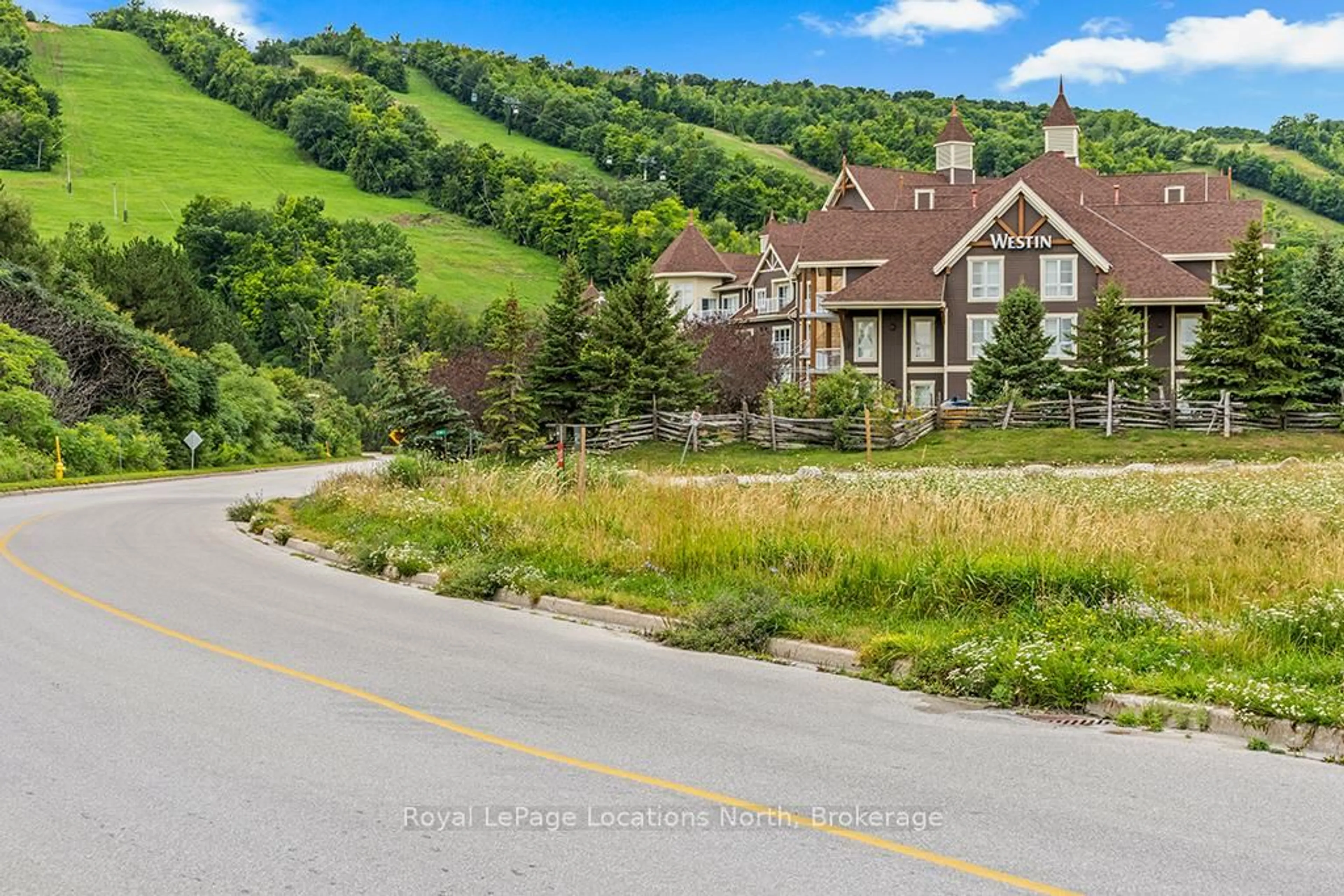 A pic from outside/outdoor area/front of a property/back of a property/a pic from drone, mountain view for 220 Gord Canning Dr #344, Blue Mountains Ontario L9Y 0V9