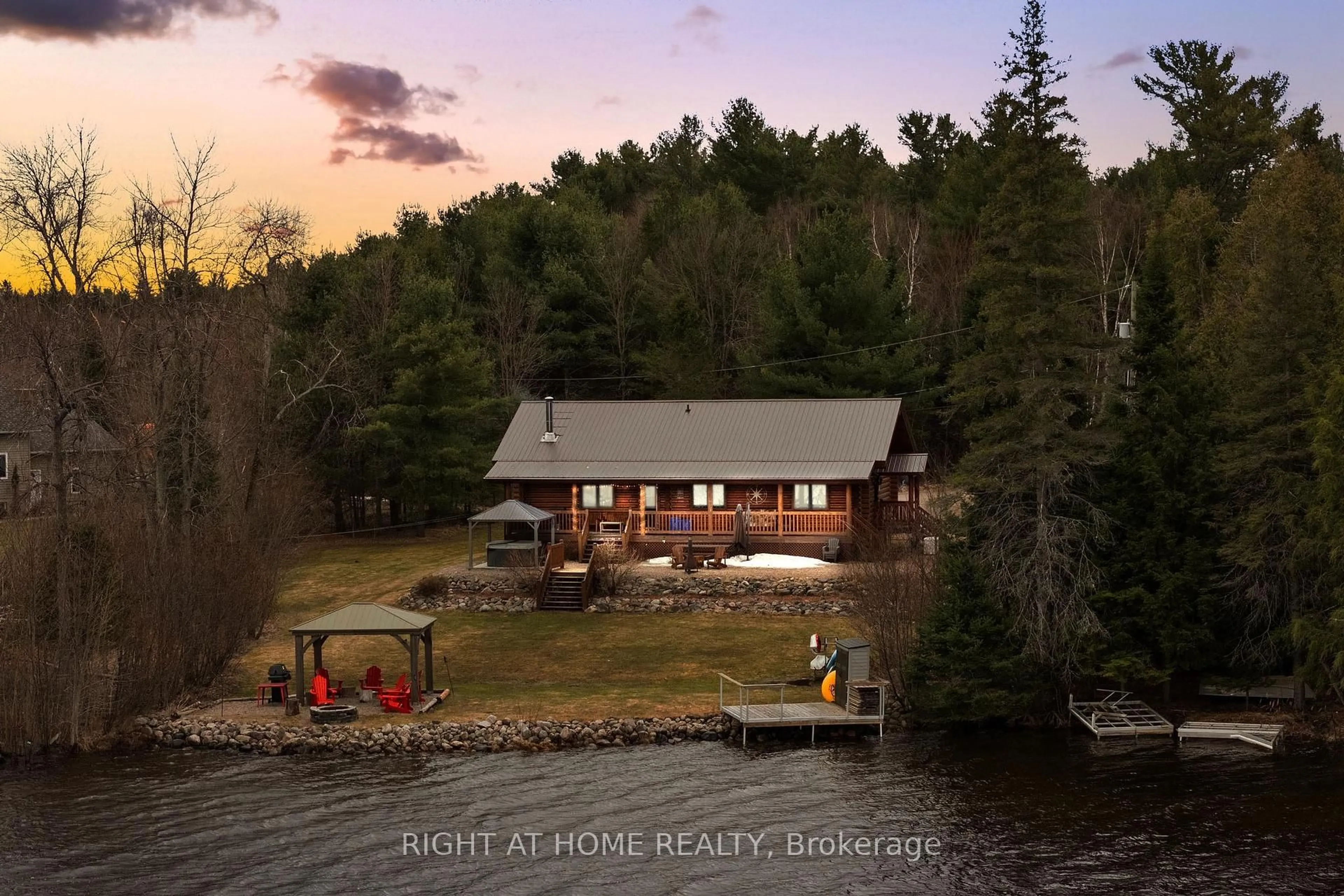 A pic from outside/outdoor area/front of a property/back of a property/a pic from drone, water/lake/river/ocean view for 121 Muskie Lane, Golden Lake Ontario K0J 1X0