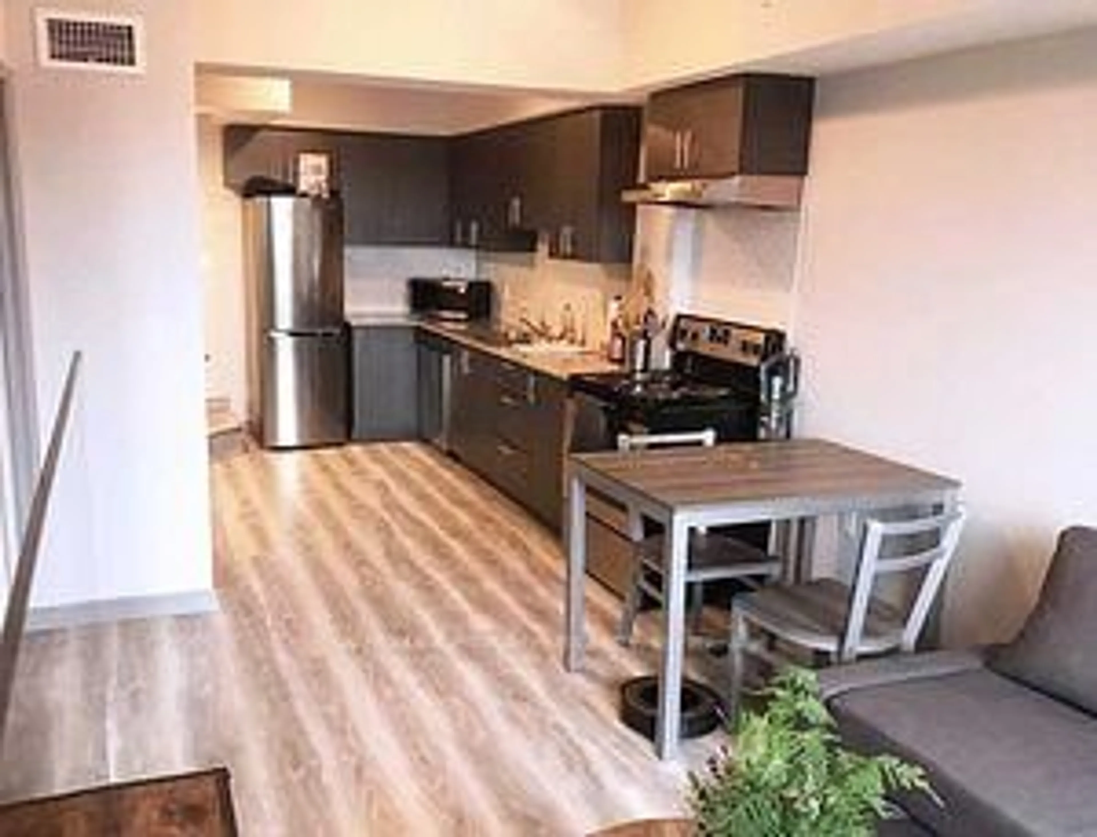 Open concept kitchen, wood/laminate floor for 275 Larch St #G215, Waterloo Ontario N2L 3R2
