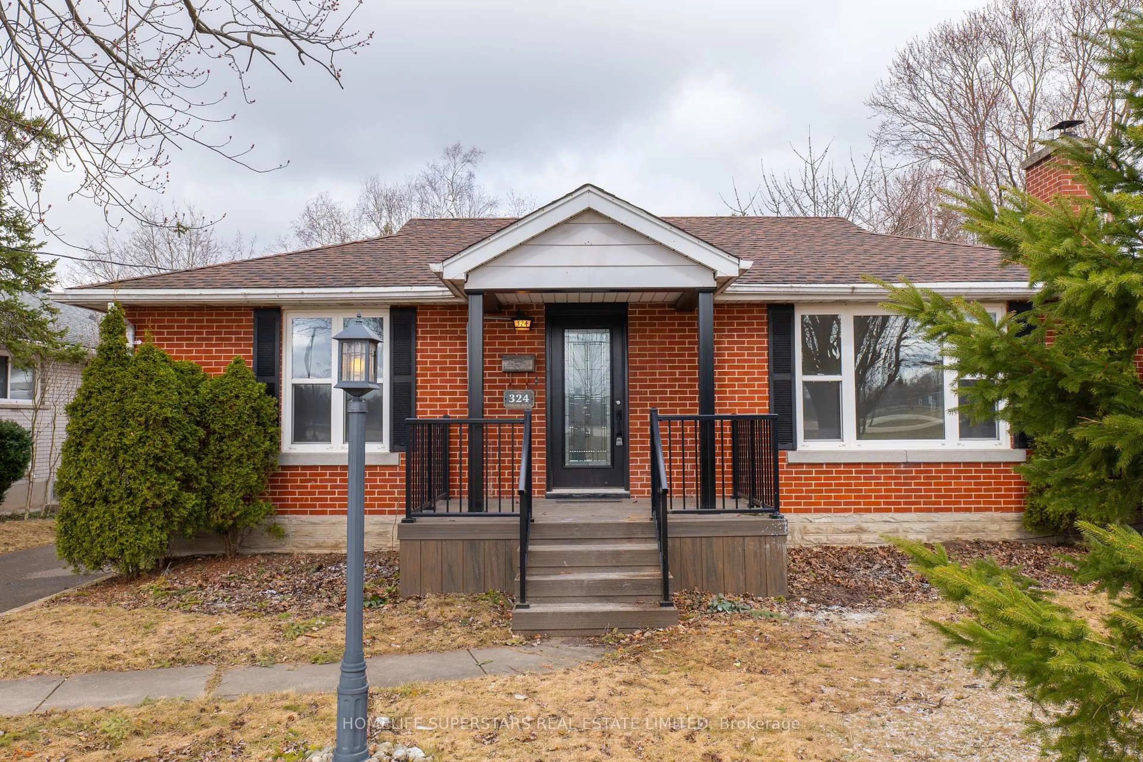 Home with brick exterior material, street for 324 Stirling Ave, Kitchener Ontario N2H 3H4