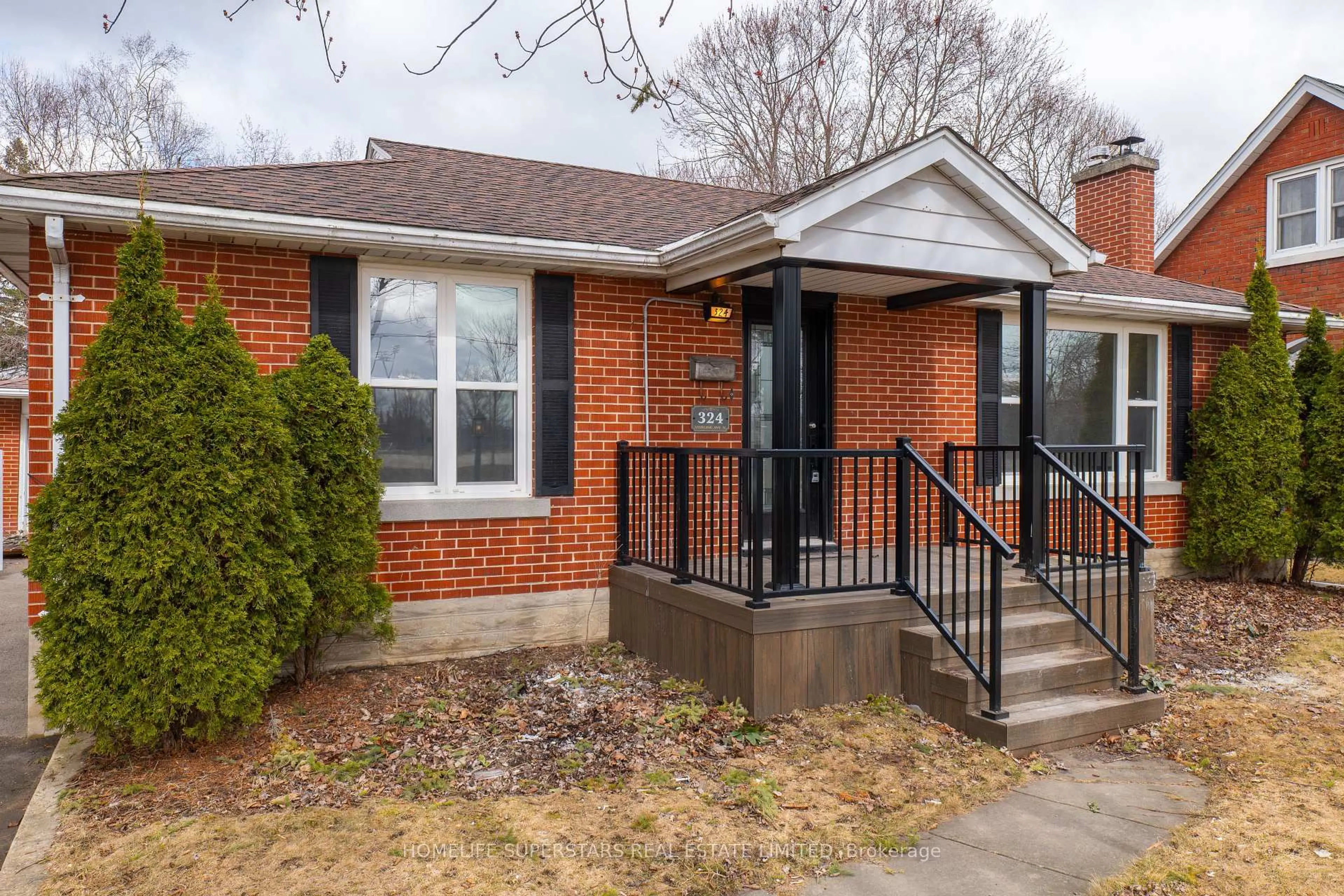 Home with brick exterior material, street for 324 Stirling Ave, Kitchener Ontario N2H 3H4