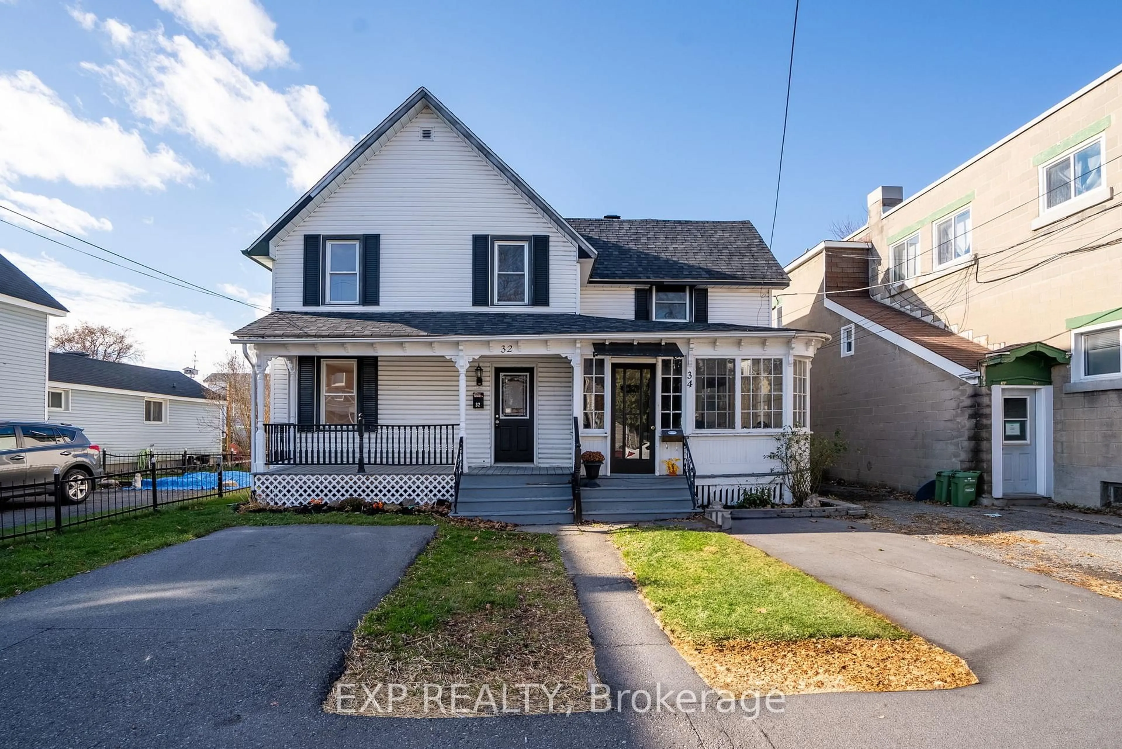 Home with vinyl exterior material, street for 32-34 Gloucester St, Cornwall Ontario K6H 3W2