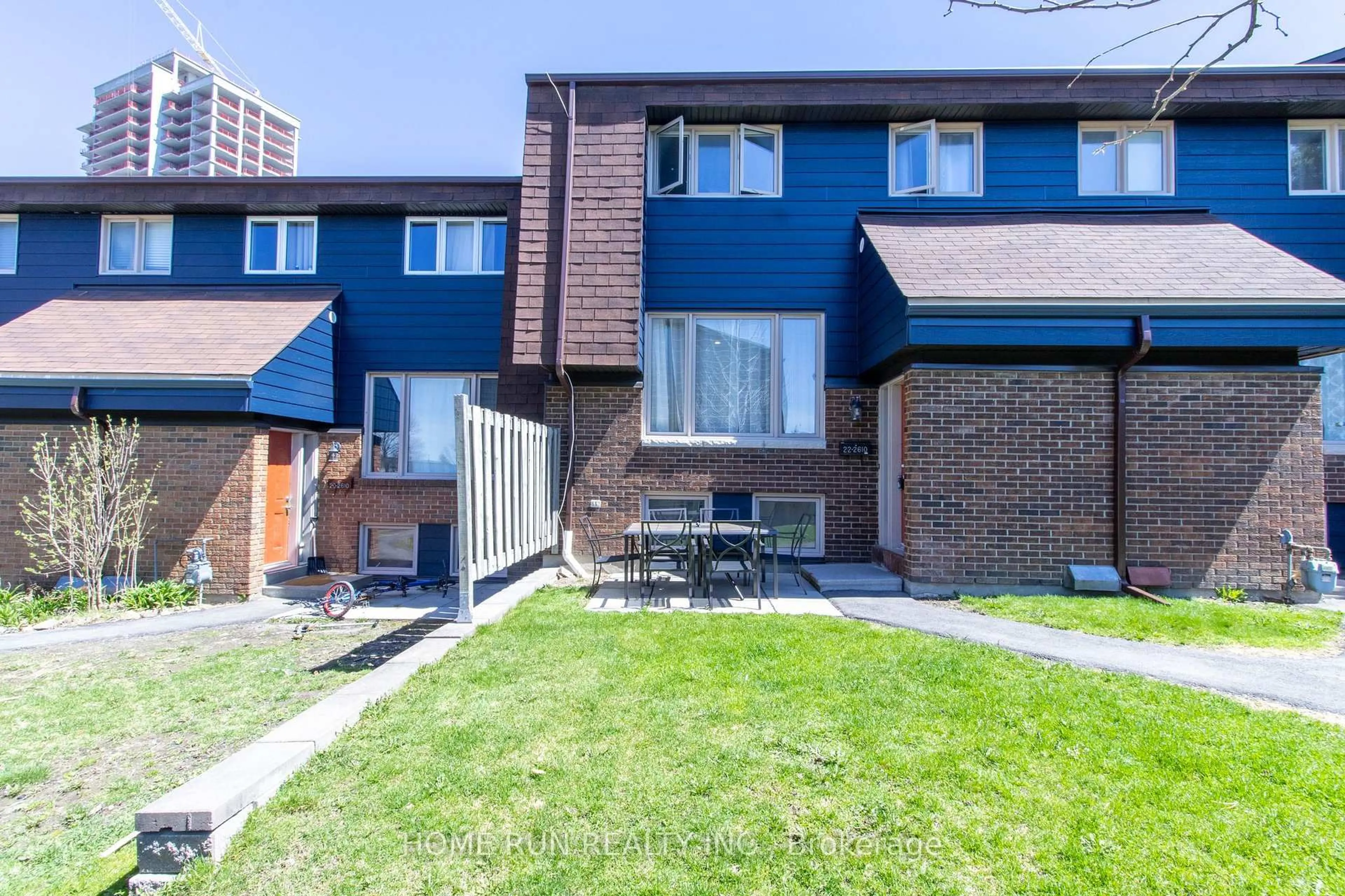 A pic from outside/outdoor area/front of a property/back of a property/a pic from drone, street for 2610 DRAPER Ave #22, Ottawa Ontario K2H 8X8