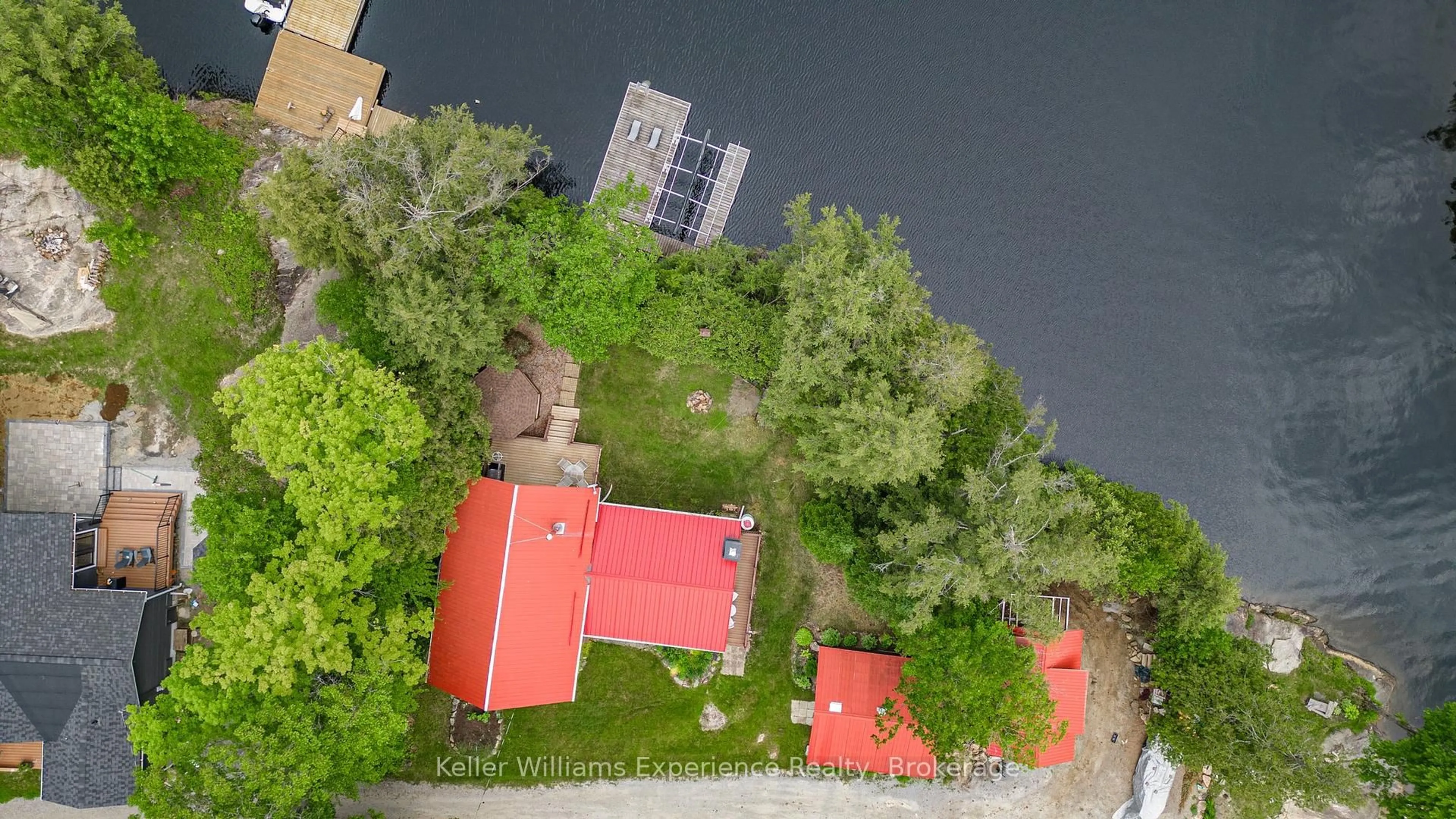 A pic from outside/outdoor area/front of a property/back of a property/a pic from drone, city buildings view from balcony for 1077 Friendship Lane, Algonquin Highlands Ontario K0M 1J2