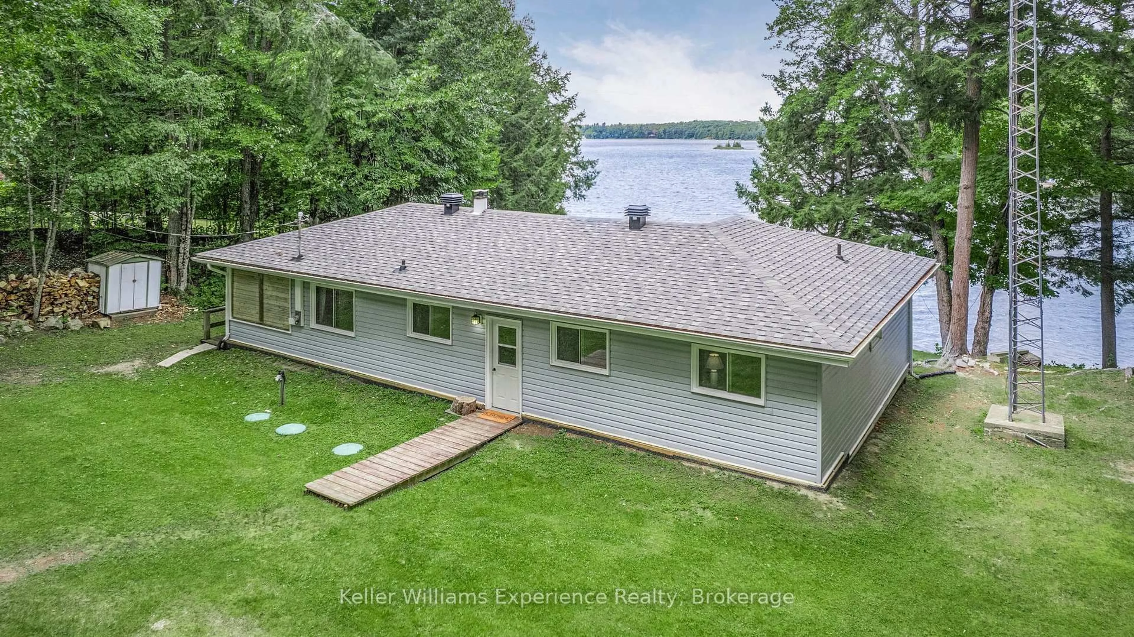 A pic from outside/outdoor area/front of a property/back of a property/a pic from drone, water/lake/river/ocean view for 1181 Staunton (PVT) Rd, Bracebridge Ontario P1L 1X3