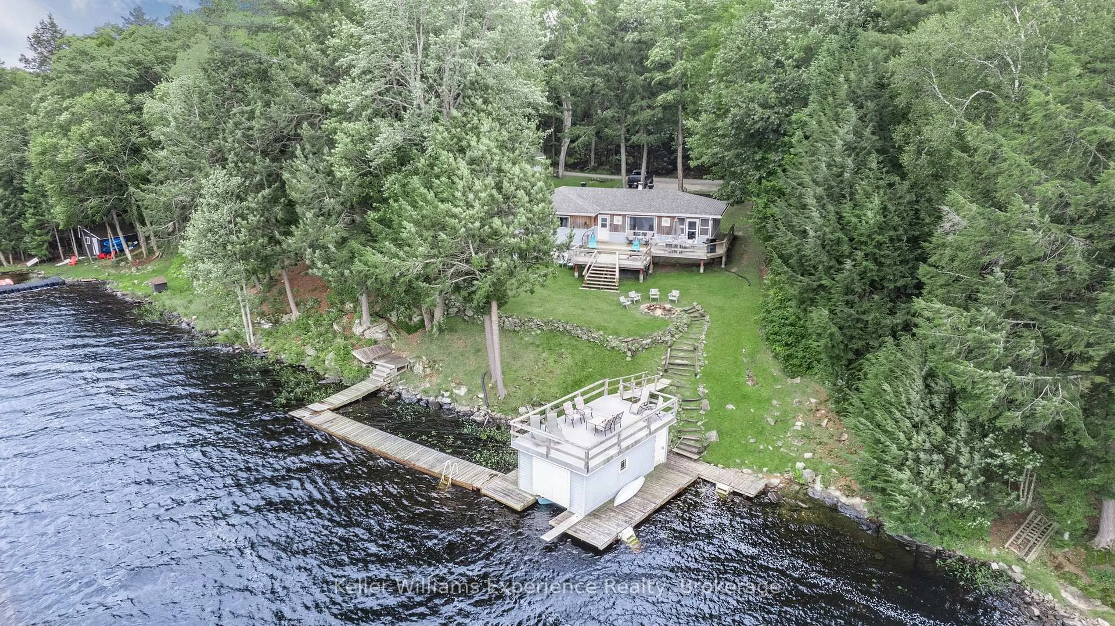 A pic from outside/outdoor area/front of a property/back of a property/a pic from drone, water/lake/river/ocean view for 1181 Staunton (PVT) Rd, Bracebridge Ontario P1L 1X3