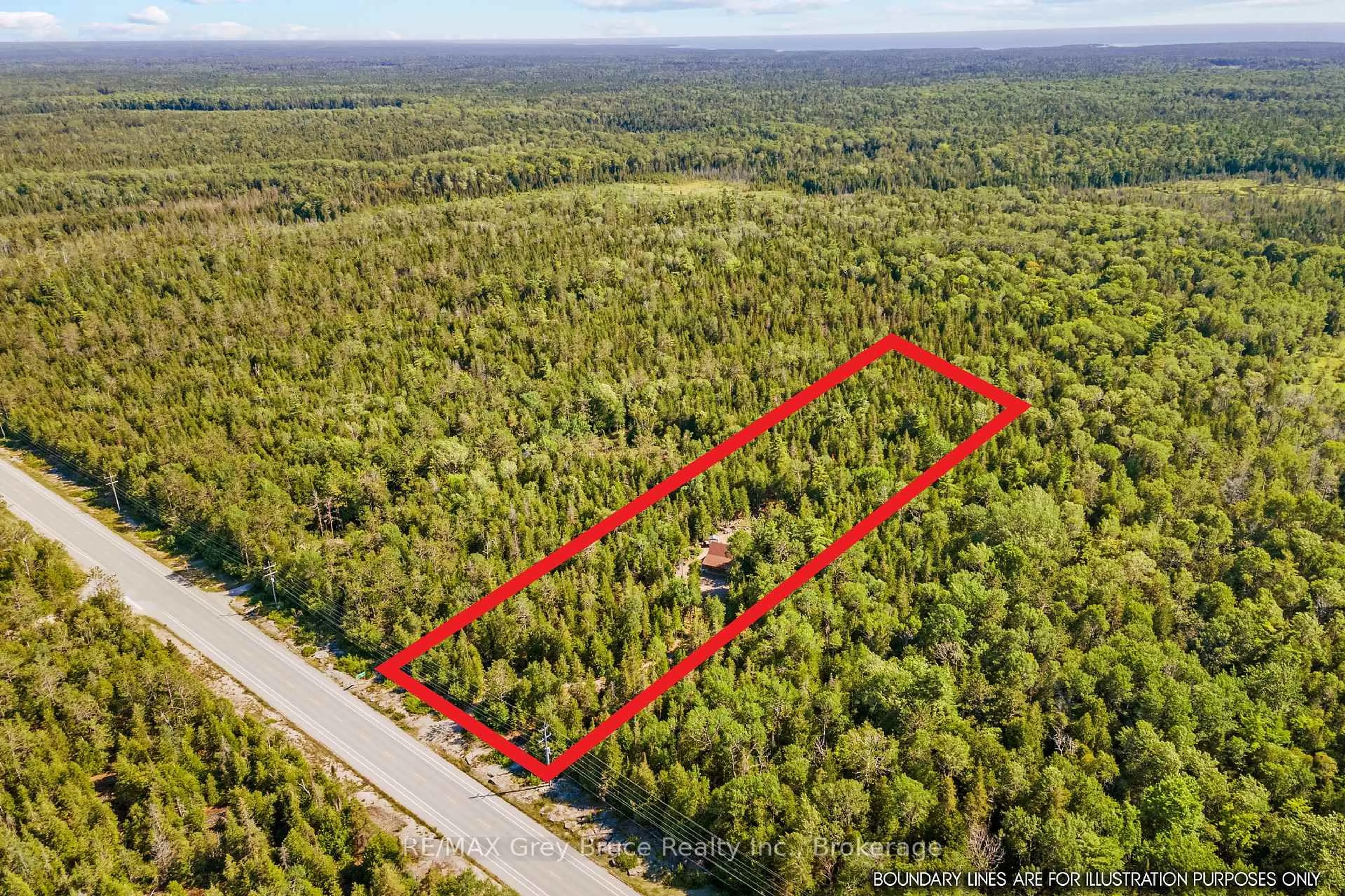 A pic from outside/outdoor area/front of a property/back of a property/a pic from drone, forest/trees view for 6053 Highway 6 N/A, Northern Bruce Peninsula Ontario N0H 2R0