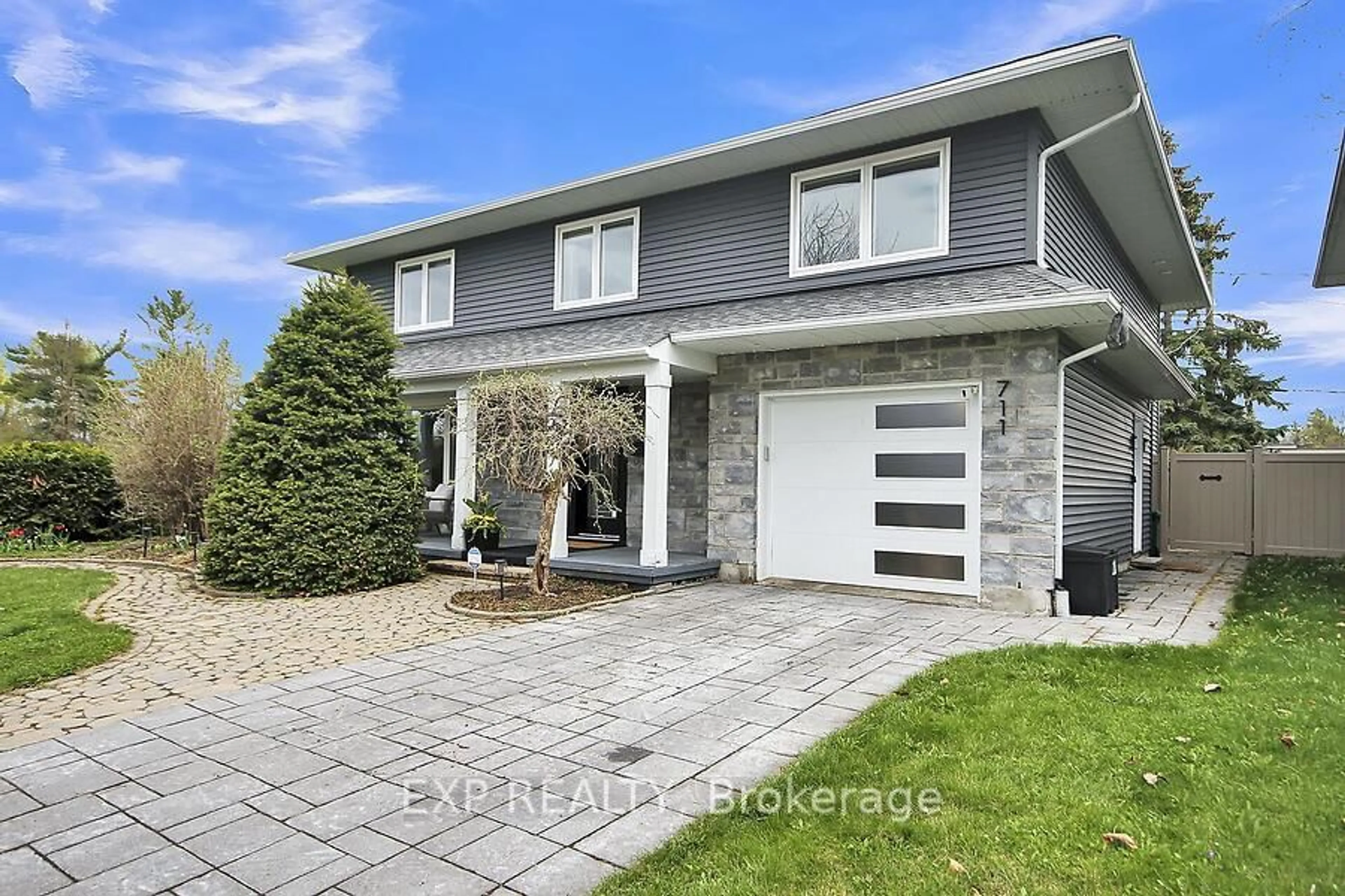 Home with brick exterior material, street for 711 Hartman Cres, Ottawa Ontario K1V 7E8