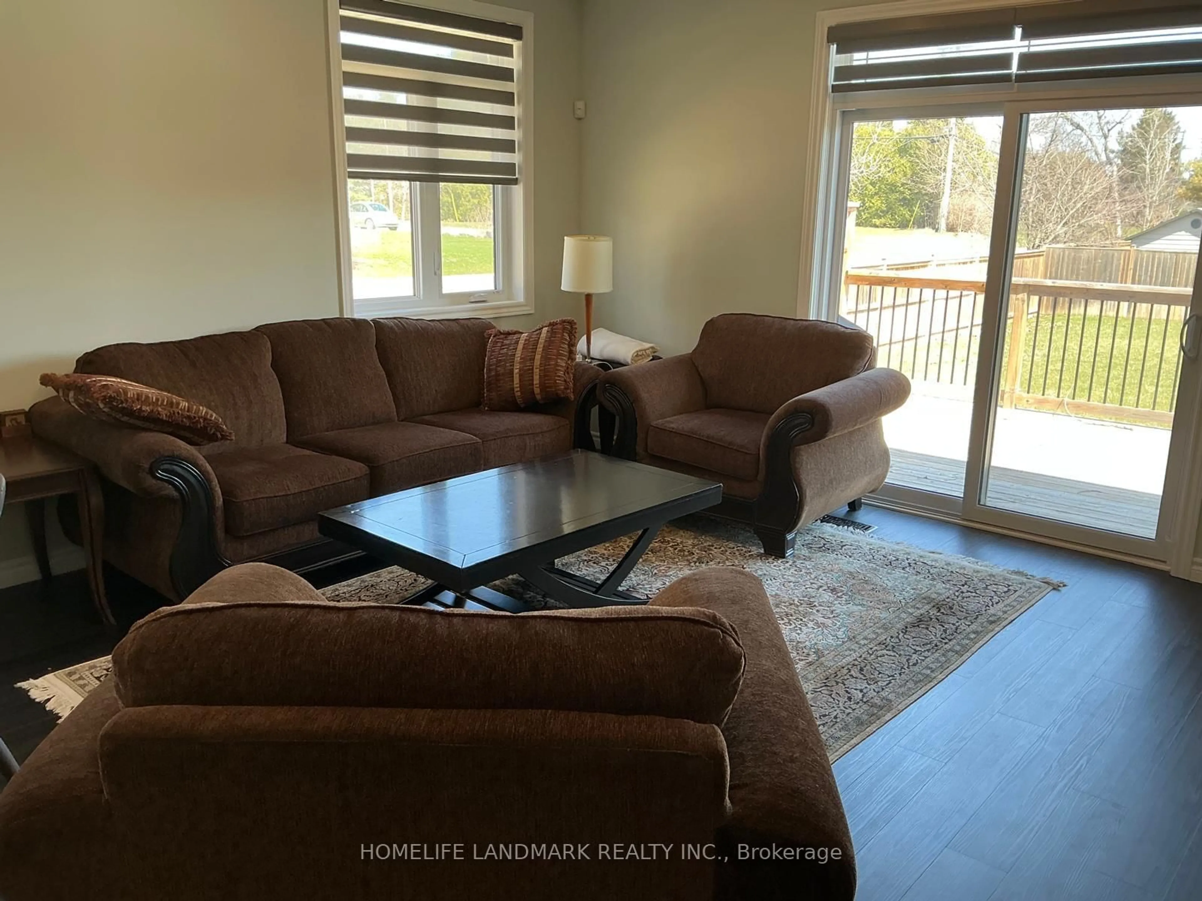 Living room with furniture, wood/laminate floor for 18 Lakewood Cres, Ingleside Ontario K8V 5P4