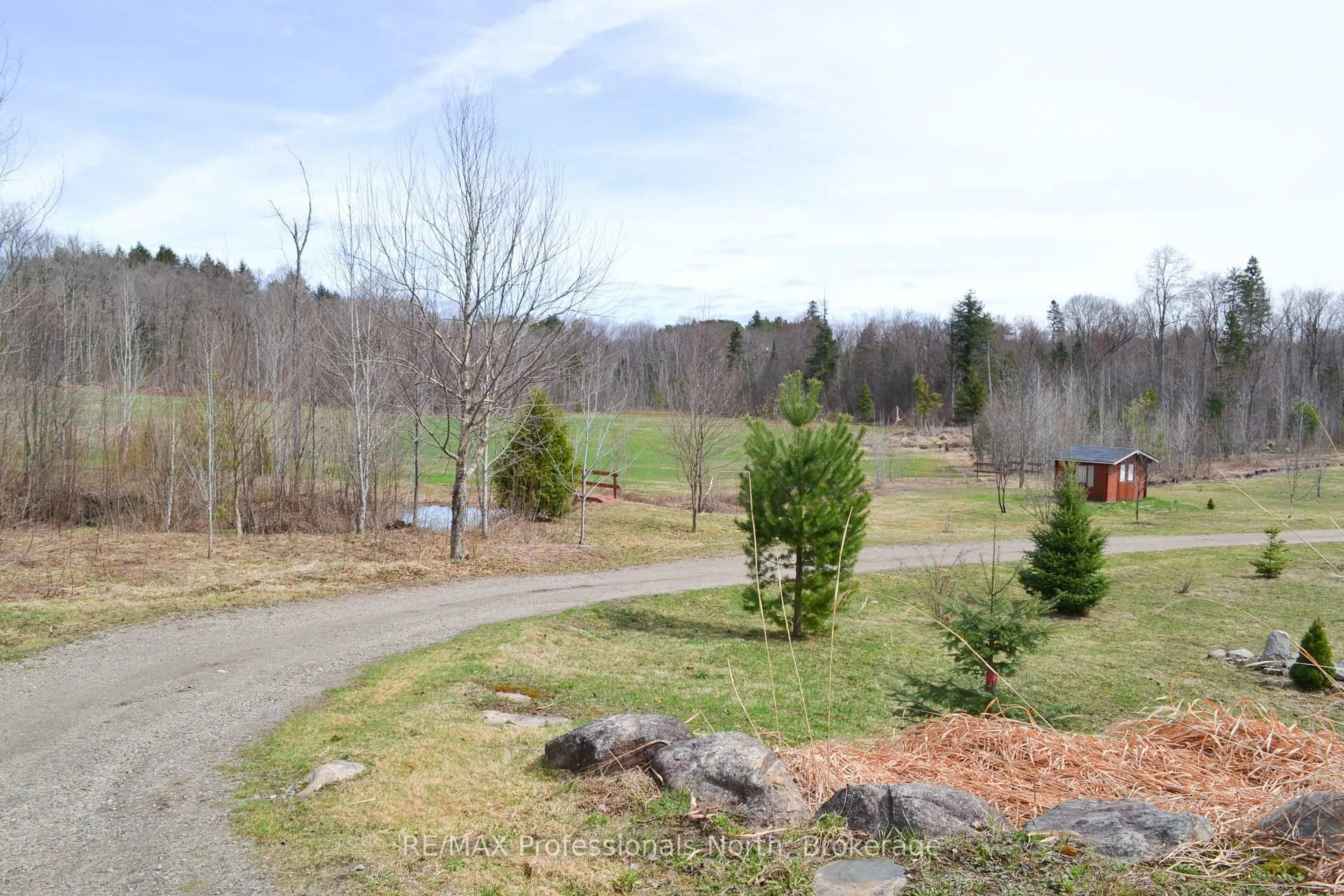 A pic from outside/outdoor area/front of a property/back of a property/a pic from drone, forest/trees view for 4043 Highway 60 N/A, Algonquin Highlands Ontario P0A 1H0