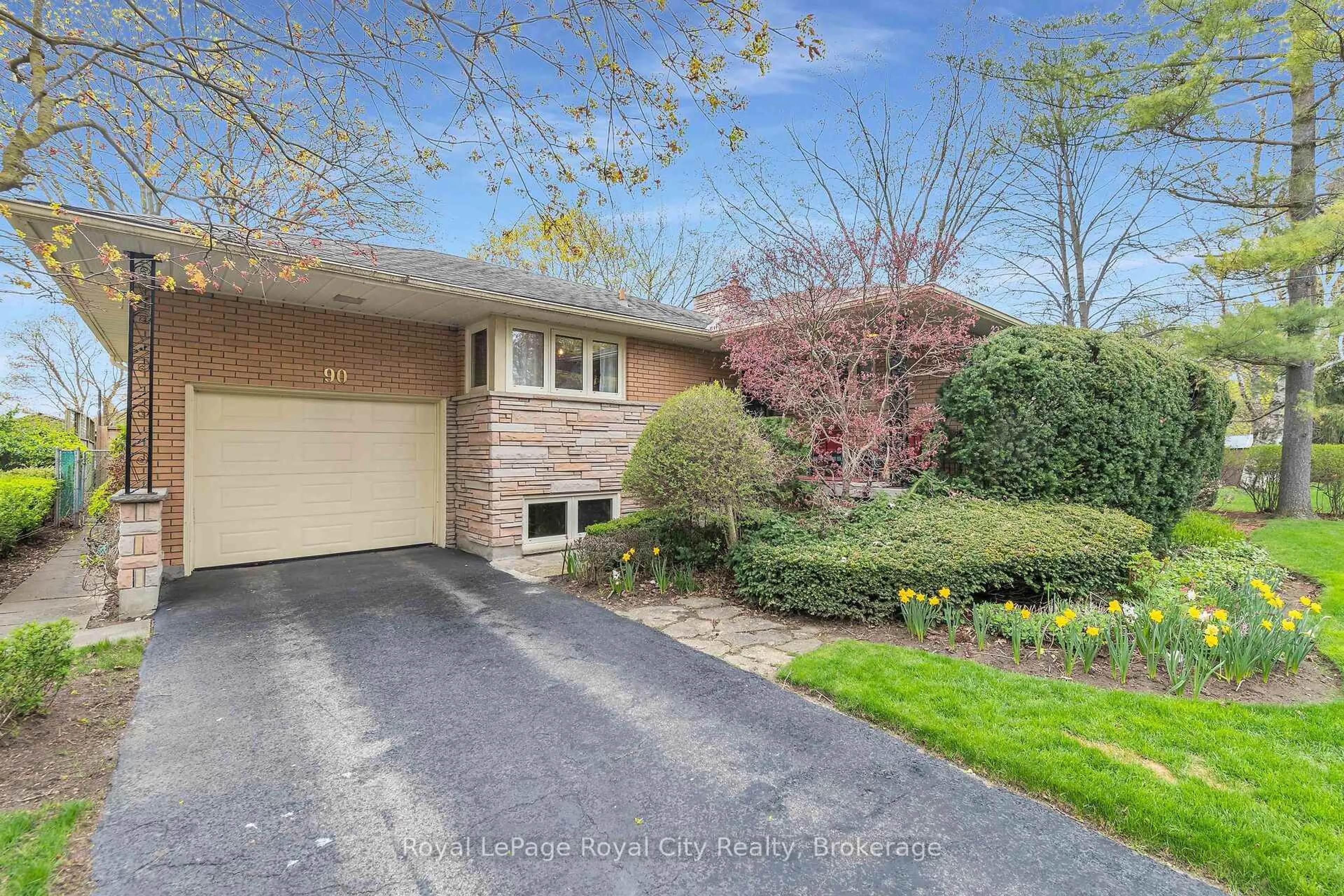 Home with brick exterior material, street for 90 Marlborough Rd, Guelph Ontario N1E 3X8