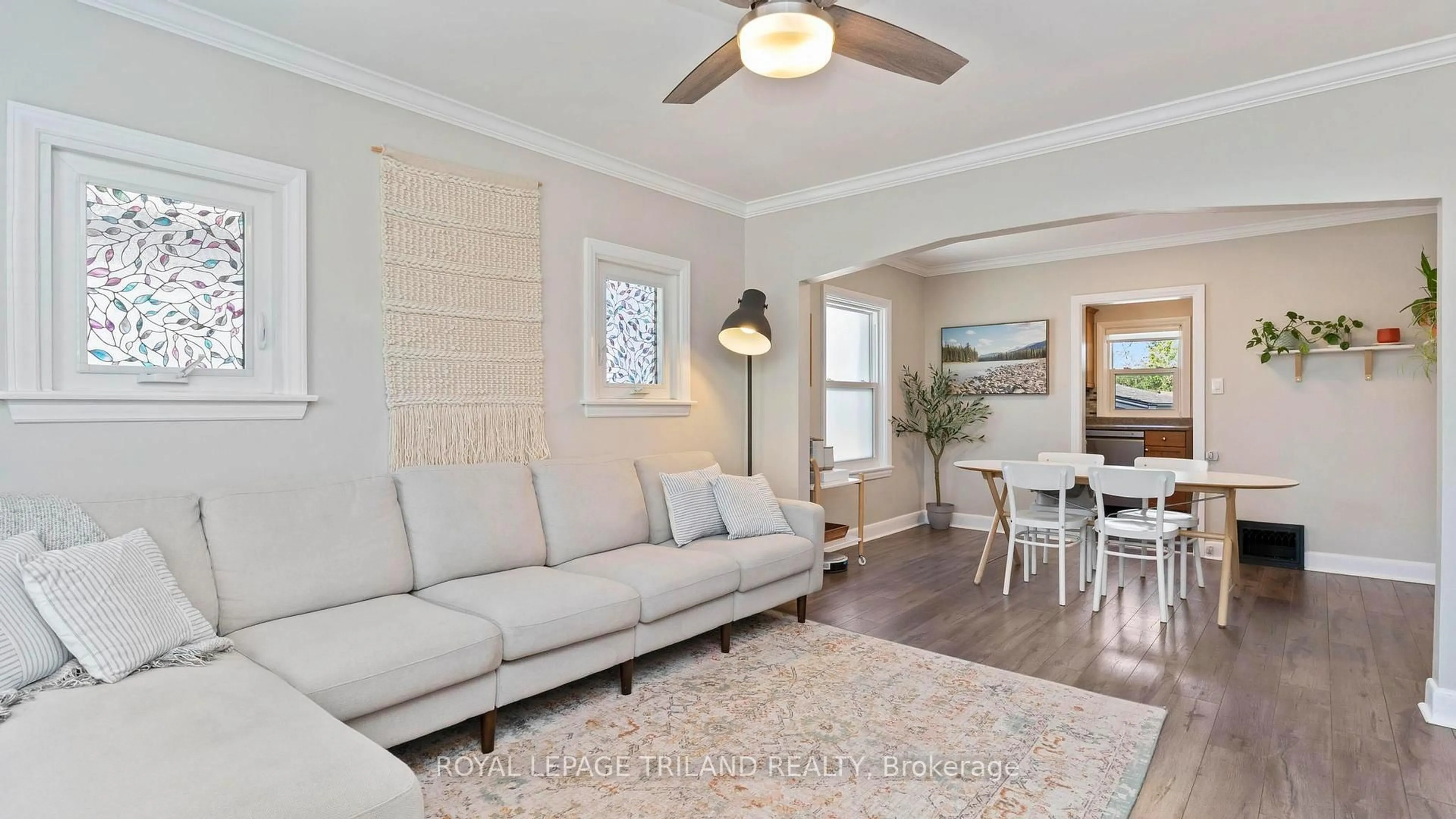 Living room with furniture, wood/laminate floor for 62 Doulton St, London East Ontario N5W 2P7