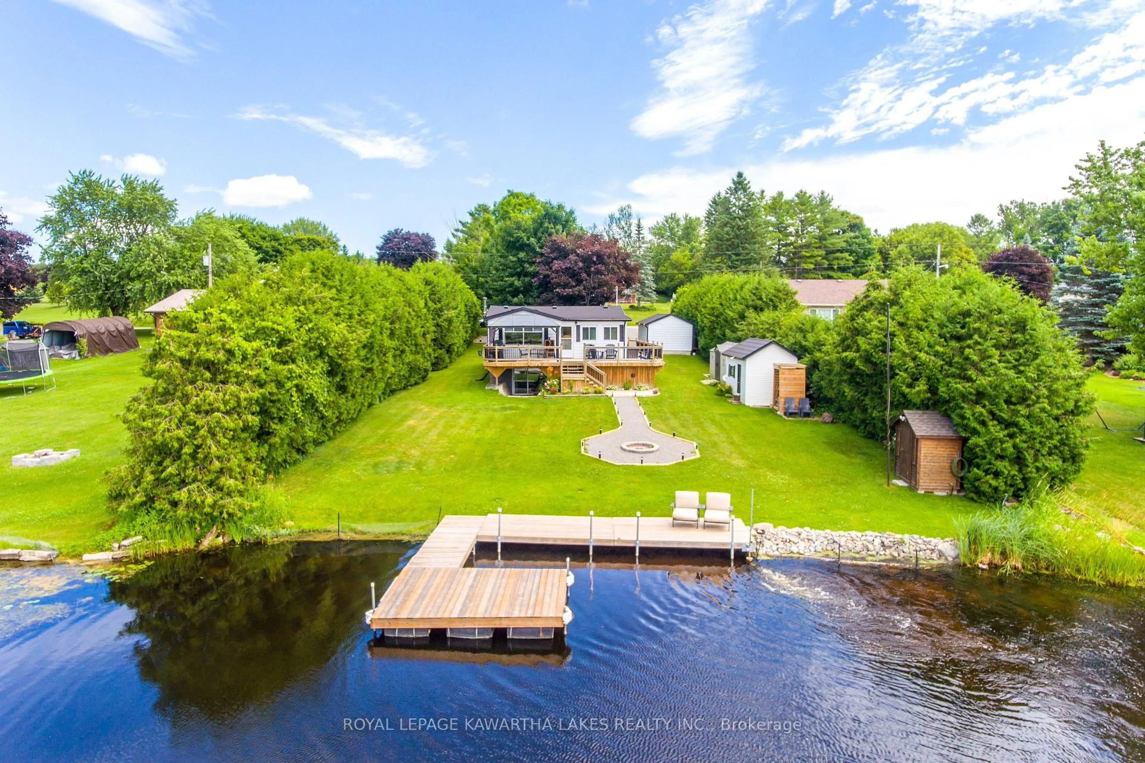 A pic from outside/outdoor area/front of a property/back of a property/a pic from drone, water/lake/river/ocean view for 28 Cadillac Blvd, Kawartha Lakes Ontario K0L 2W0