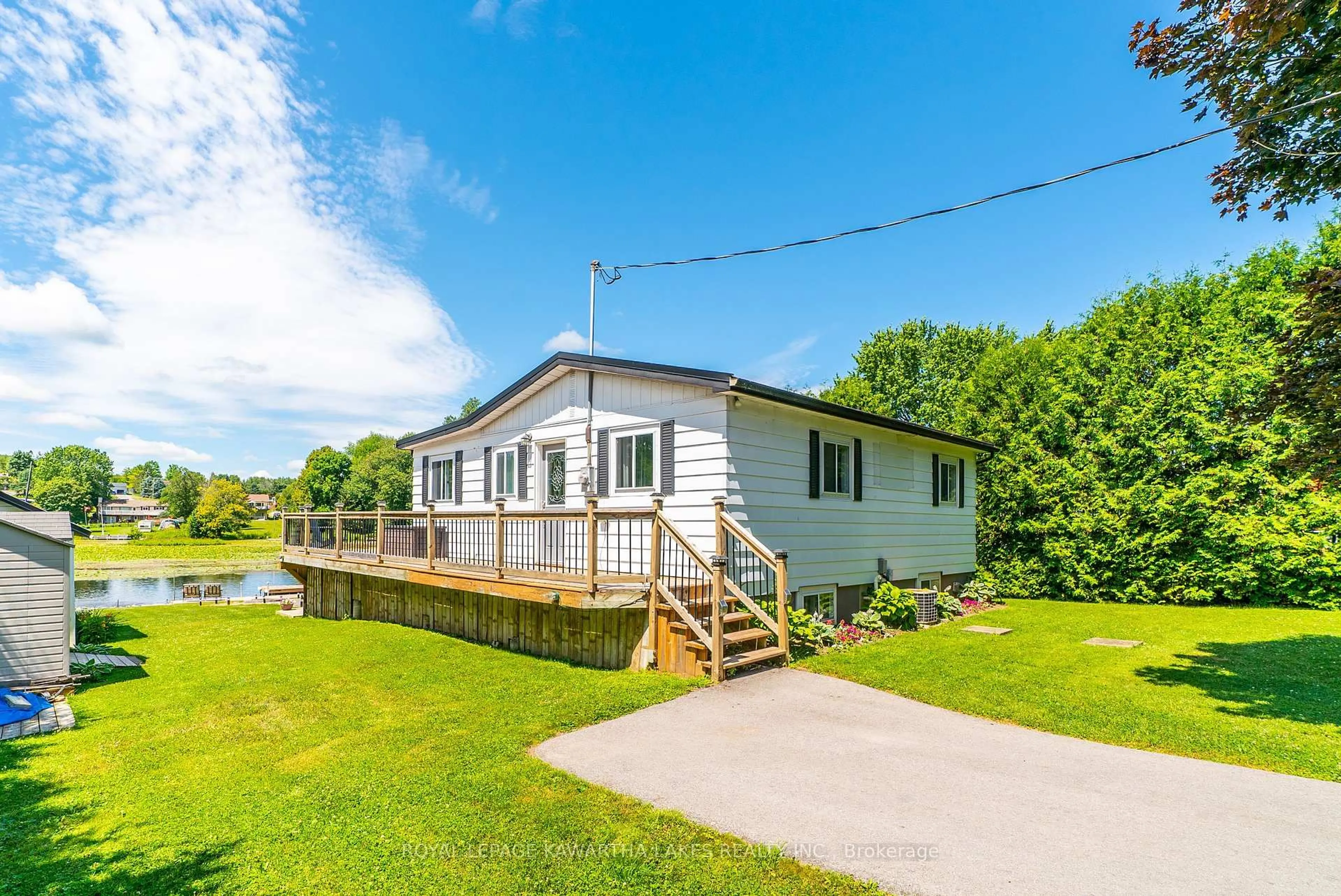 A pic from outside/outdoor area/front of a property/back of a property/a pic from drone, water/lake/river/ocean view for 28 Cadillac Blvd, Kawartha Lakes Ontario K0L 2W0