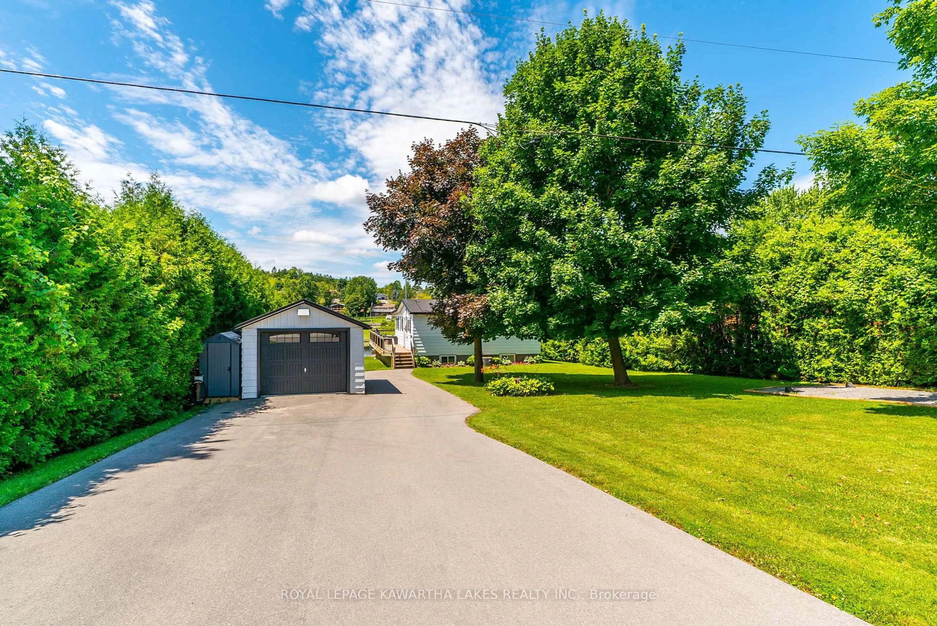 A pic from outside/outdoor area/front of a property/back of a property/a pic from drone, street for 28 Cadillac Blvd, Kawartha Lakes Ontario K0L 2W0