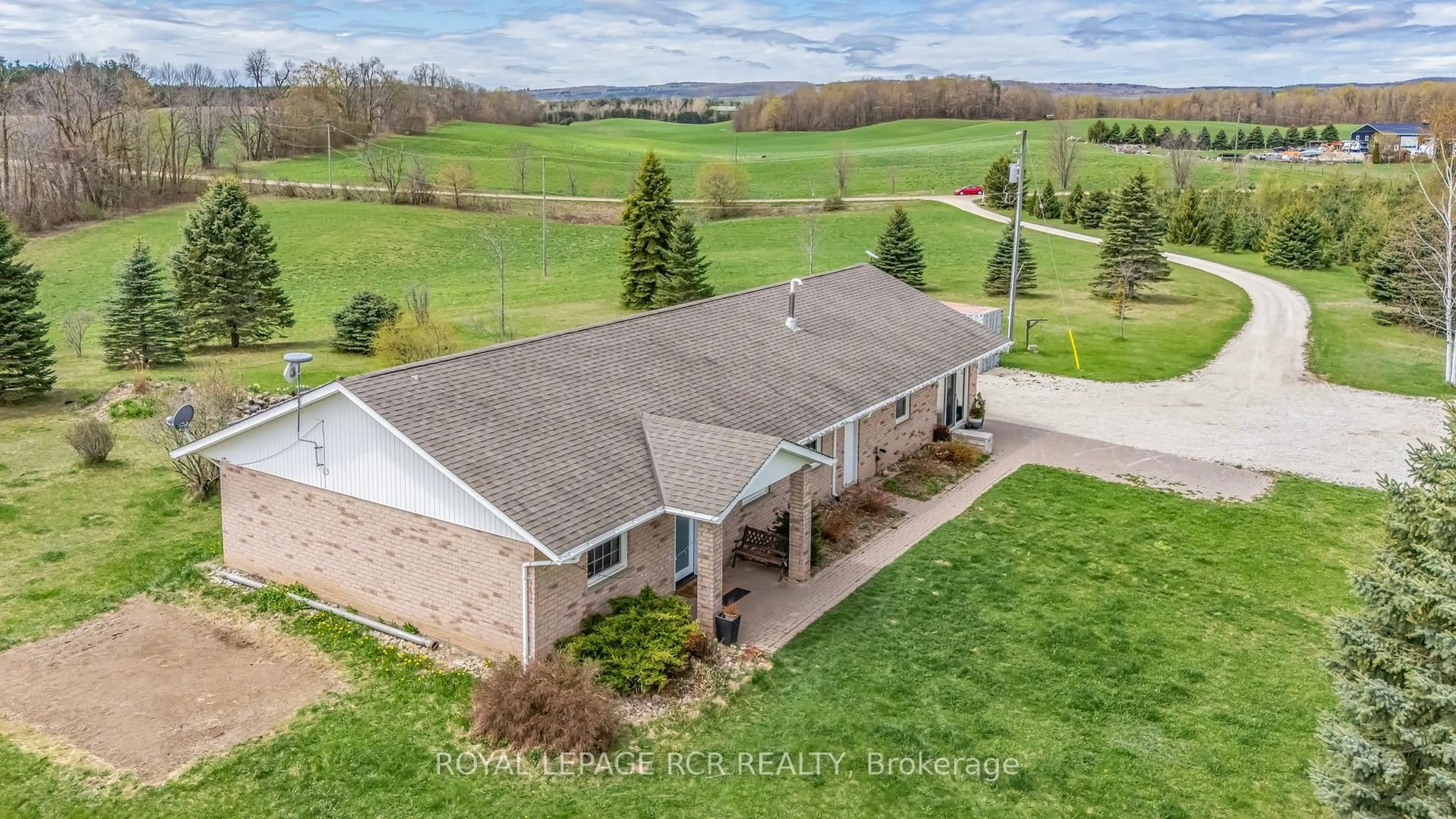 A pic from outside/outdoor area/front of a property/back of a property/a pic from drone, water/lake/river/ocean view for 958375 E 7th Line, Mulmur Ontario L9V 0M9