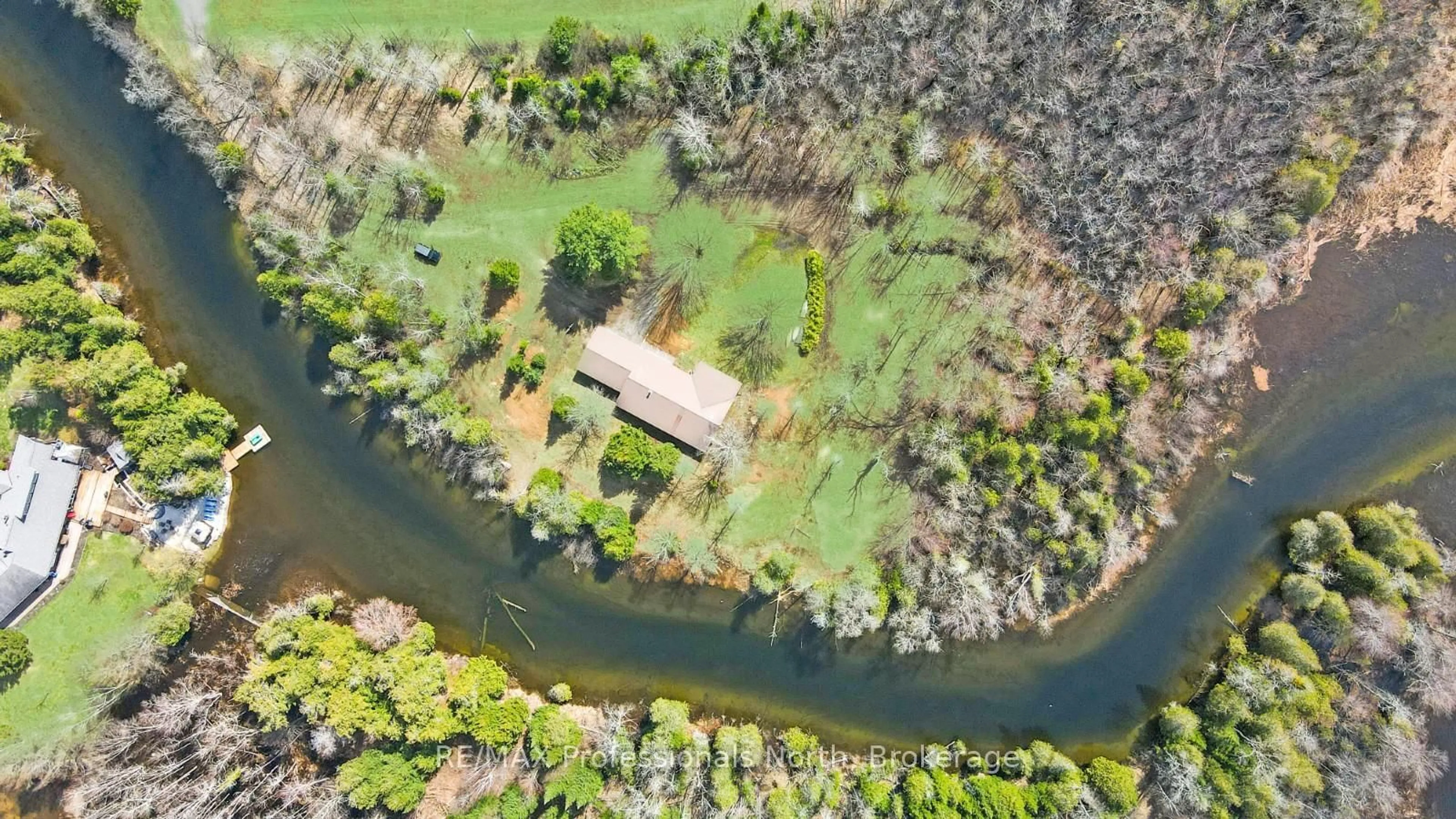 A pic from outside/outdoor area/front of a property/back of a property/a pic from drone, water/lake/river/ocean view for 11601 Highway 118 Highway, Dysart et al Ontario K0M 1S0