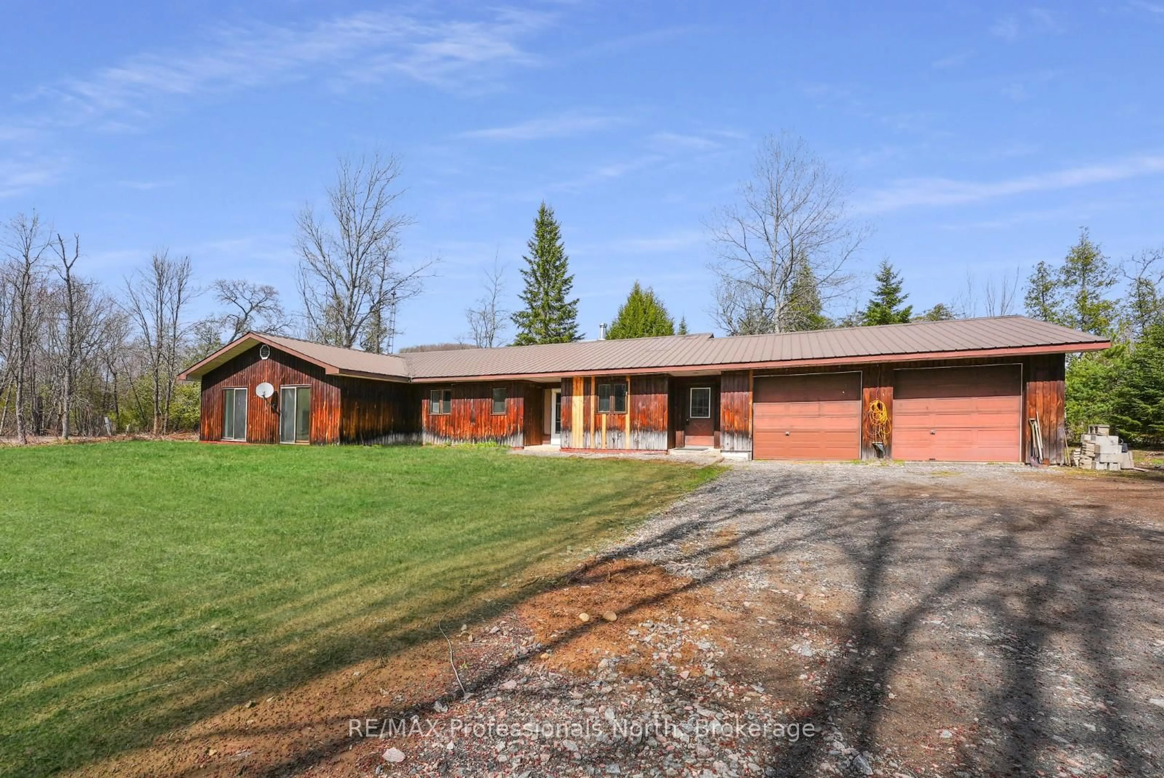 Home with brick exterior material, street for 11601 Highway 118 Highway, Dysart et al Ontario K0M 1S0