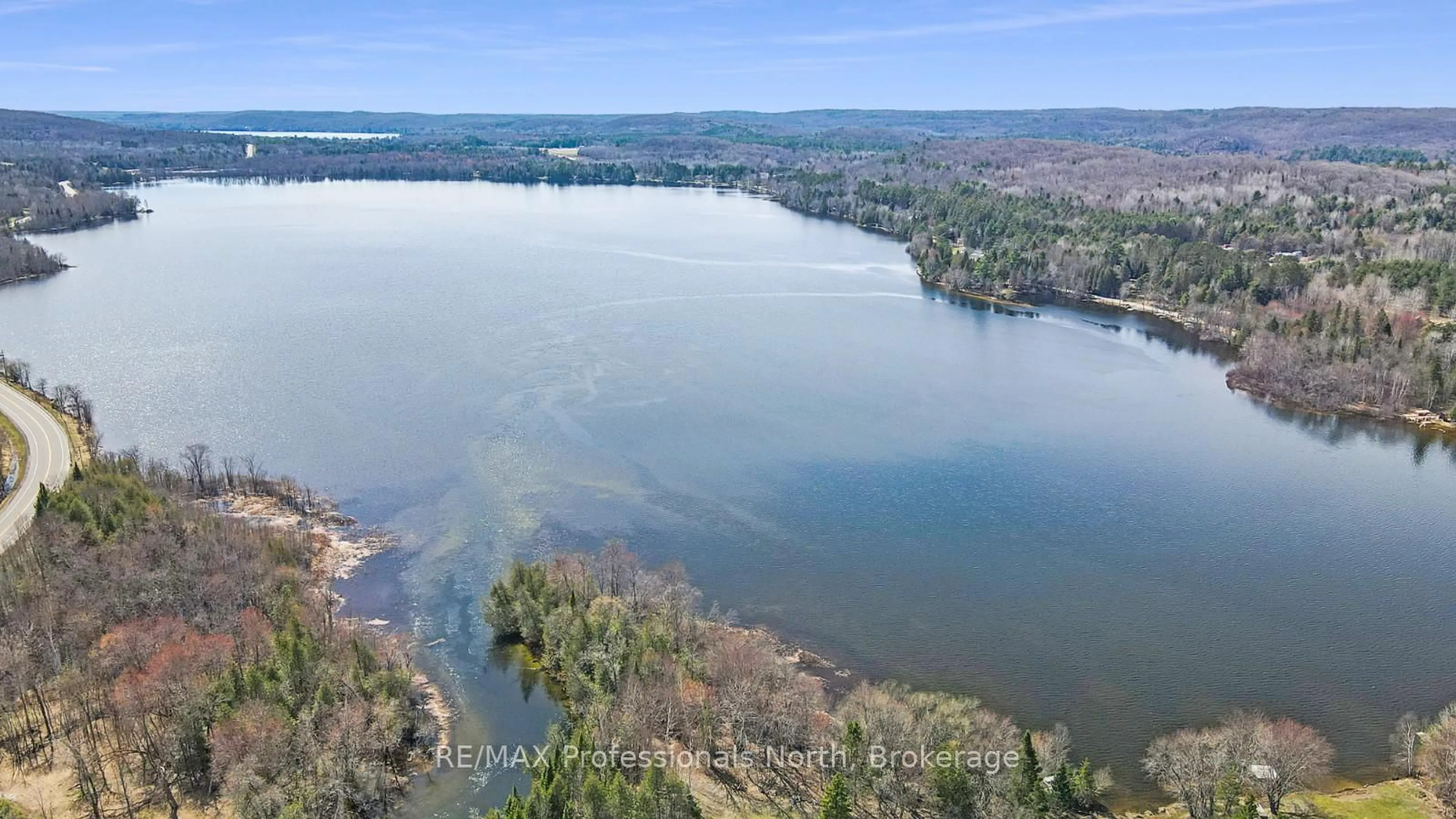 A pic from outside/outdoor area/front of a property/back of a property/a pic from drone, water/lake/river/ocean view for 11601 Highway 118 Highway, Dysart et al Ontario K0M 1S0