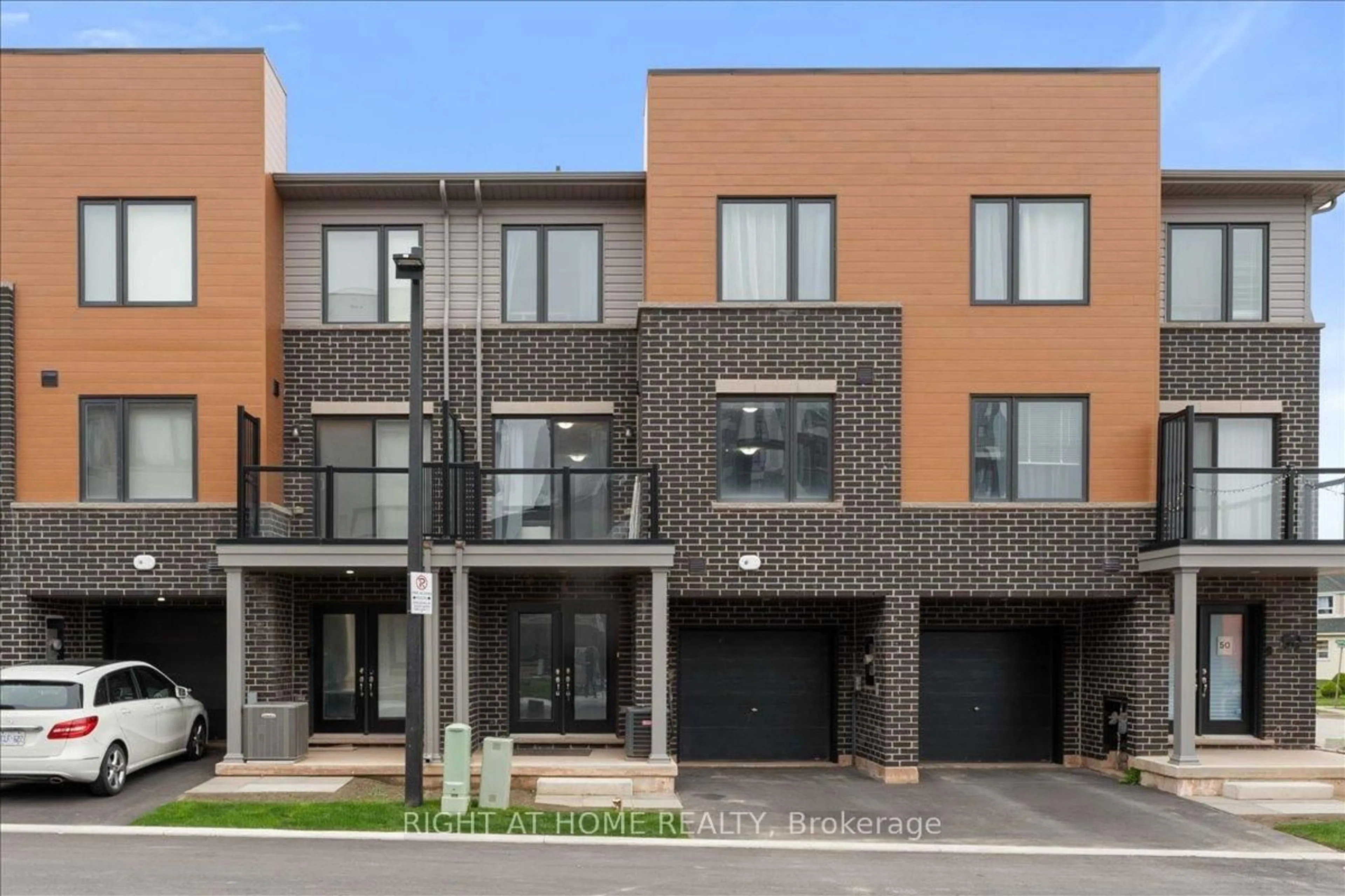 Home with brick exterior material, street for 52 Dryden Lane, Hamilton Ontario L8H 0B6