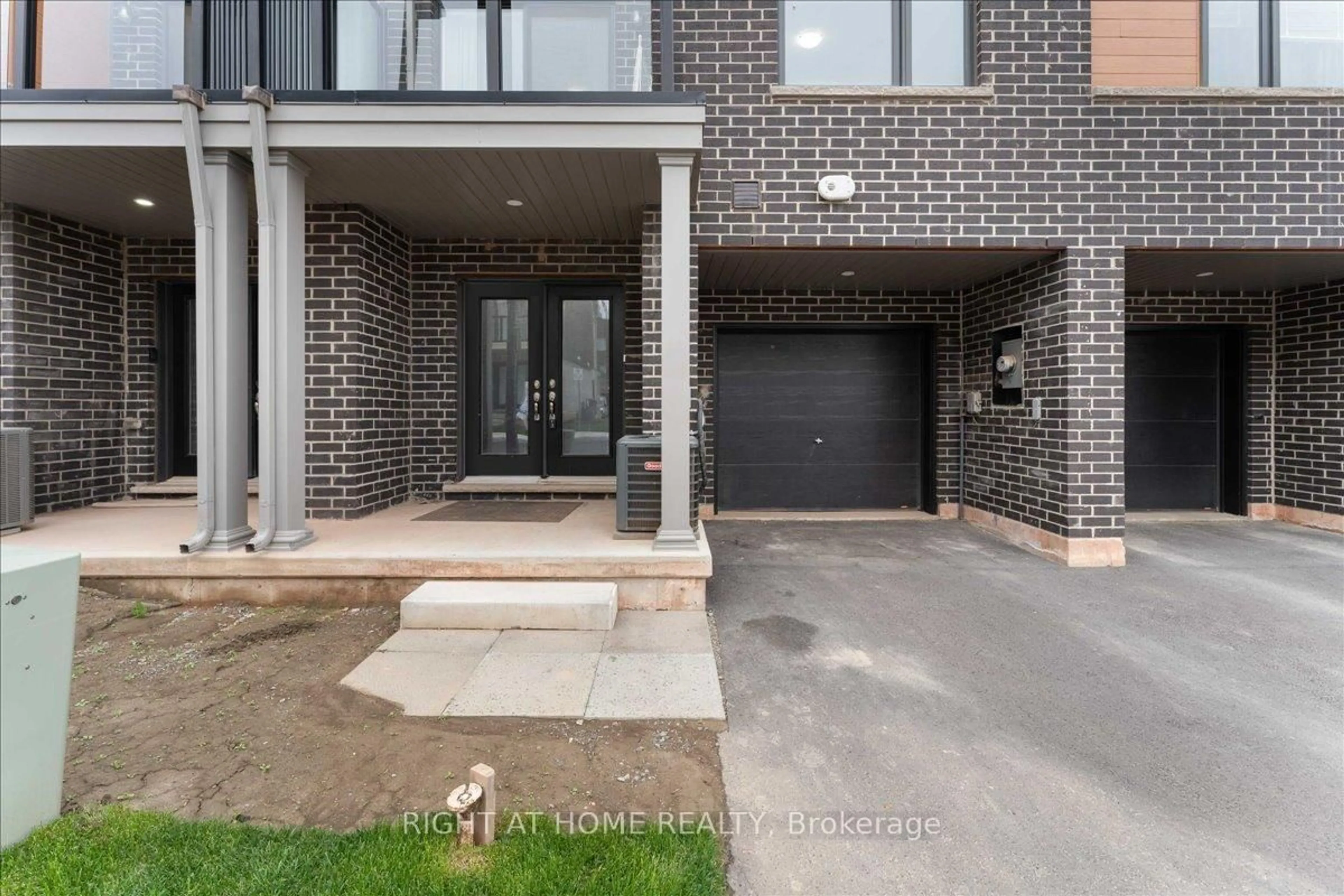 Home with brick exterior material, street for 52 Dryden Lane, Hamilton Ontario L8H 0B6