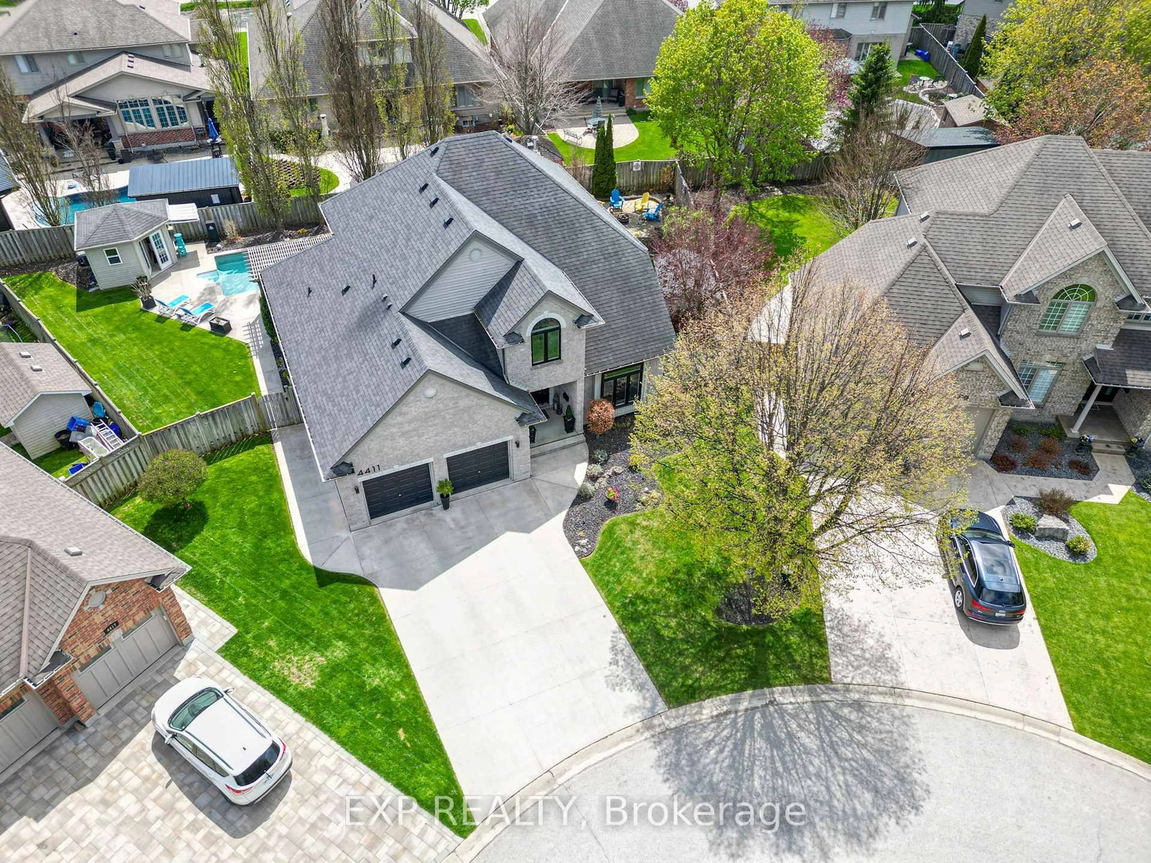 A pic from outside/outdoor area/front of a property/back of a property/a pic from drone, street for 4411 Malpass Pl, London South Ontario N6P 1T3