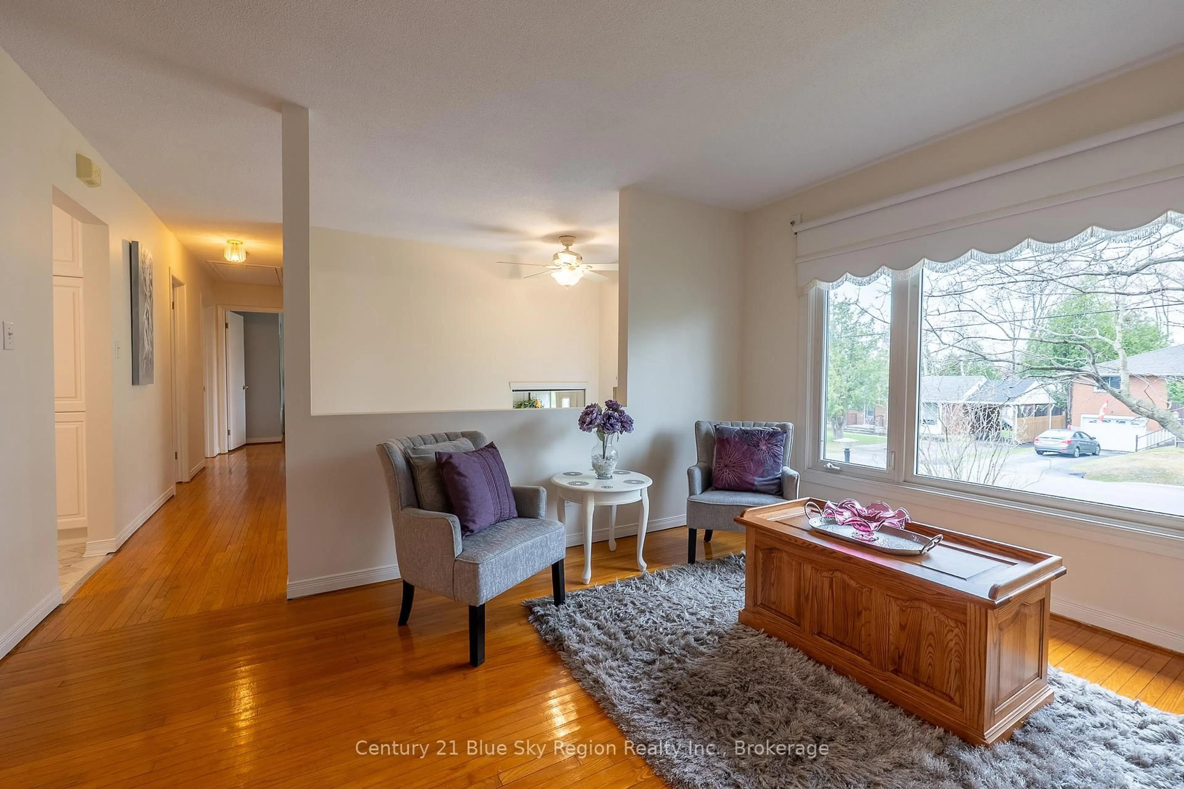 Living room with furniture, wood/laminate floor for 252 Glen Rouge Dr, North Bay Ontario P1A 3H8